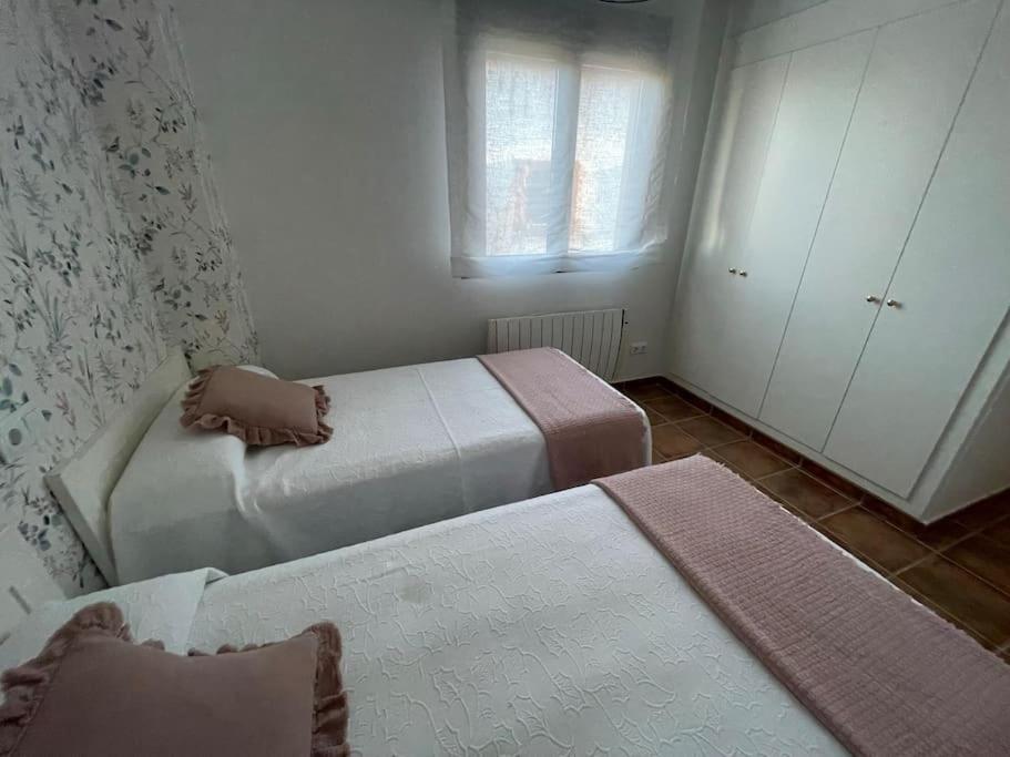 Casa de cuatro habitaciones
