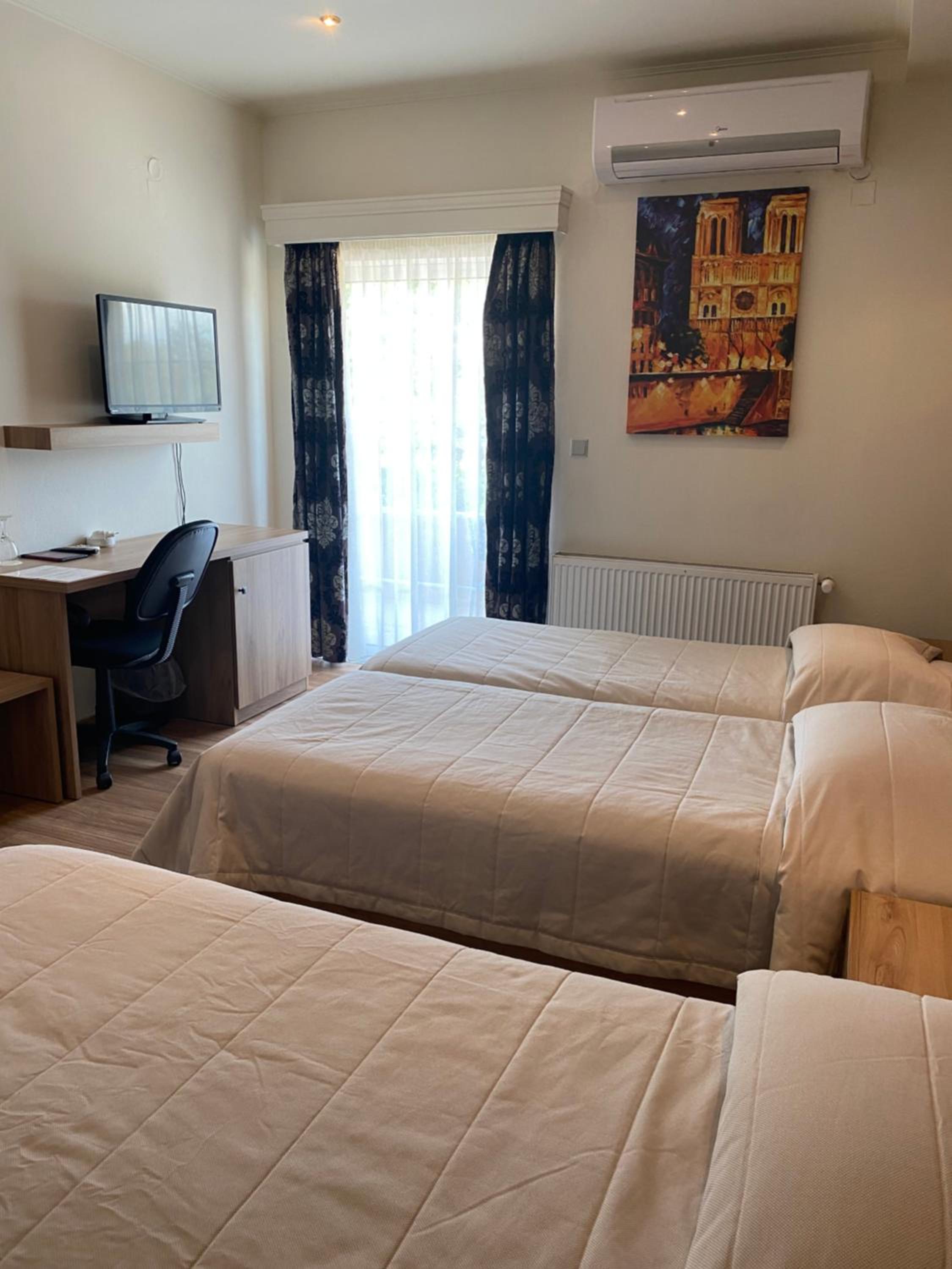 Triple Room - Photo 1