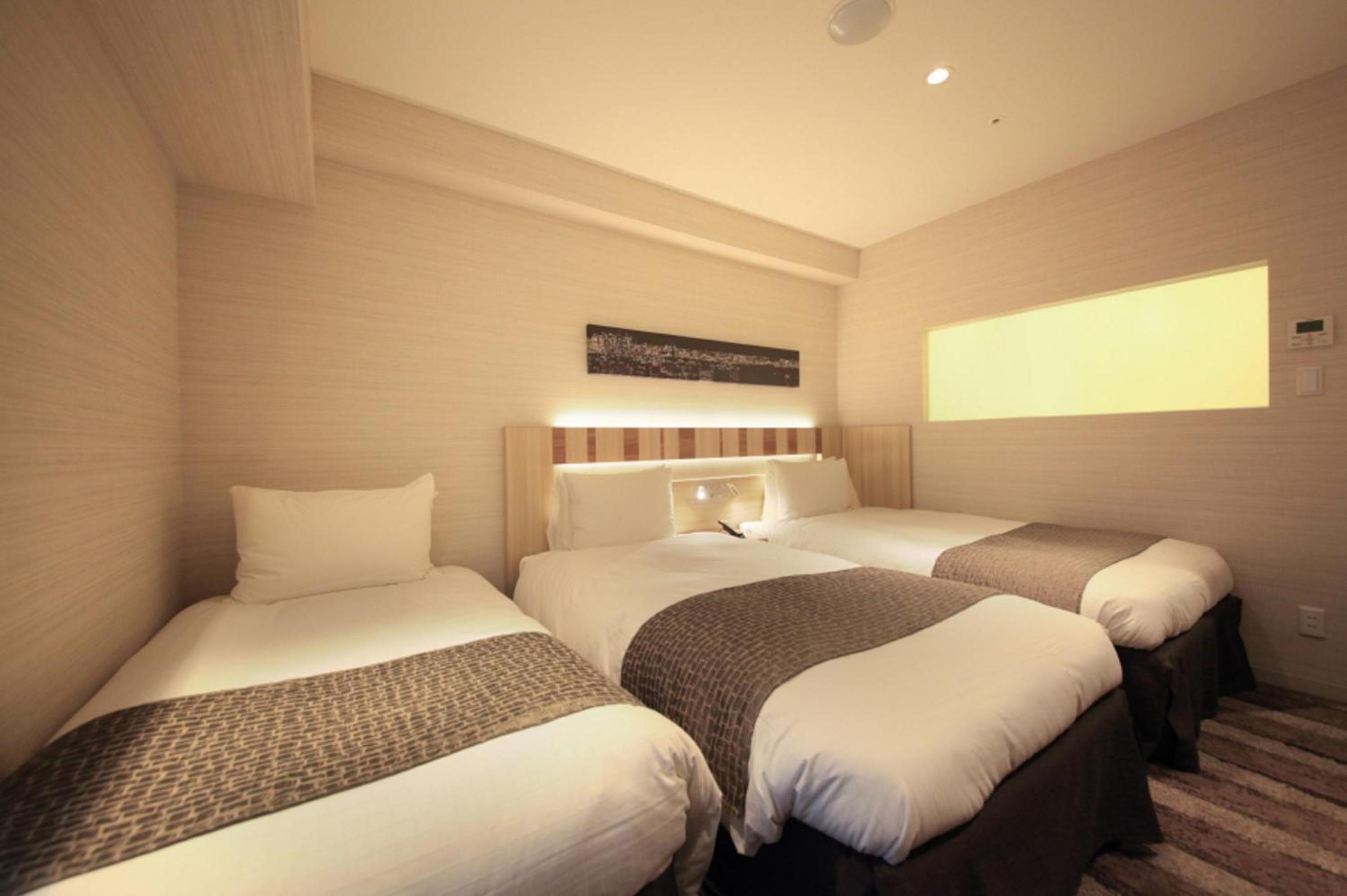 Twin Room with Extra Bed - Smoking photo 2