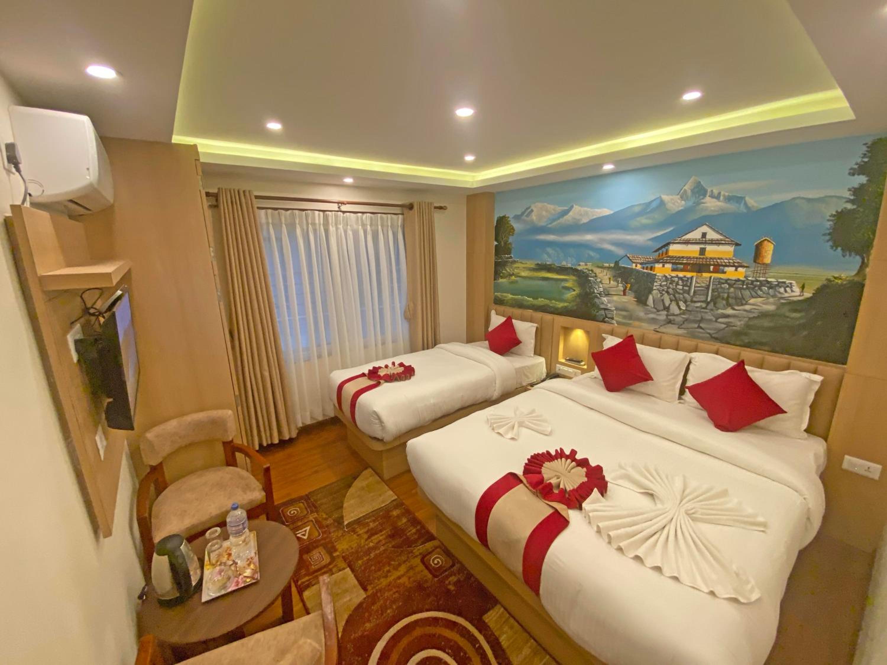 Deluxe Triple Room - Photo 15