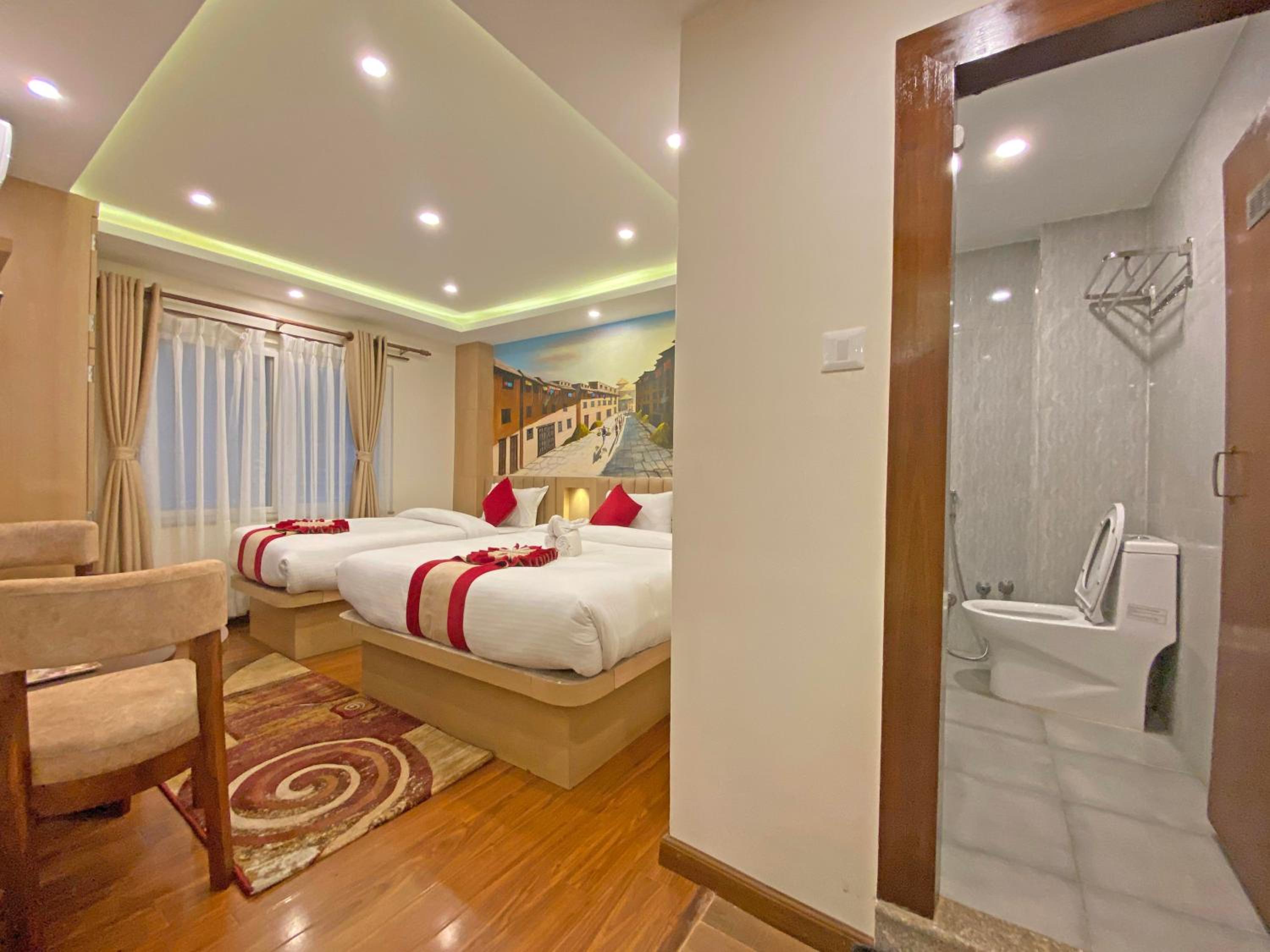 Deluxe Triple Room - Photo 9