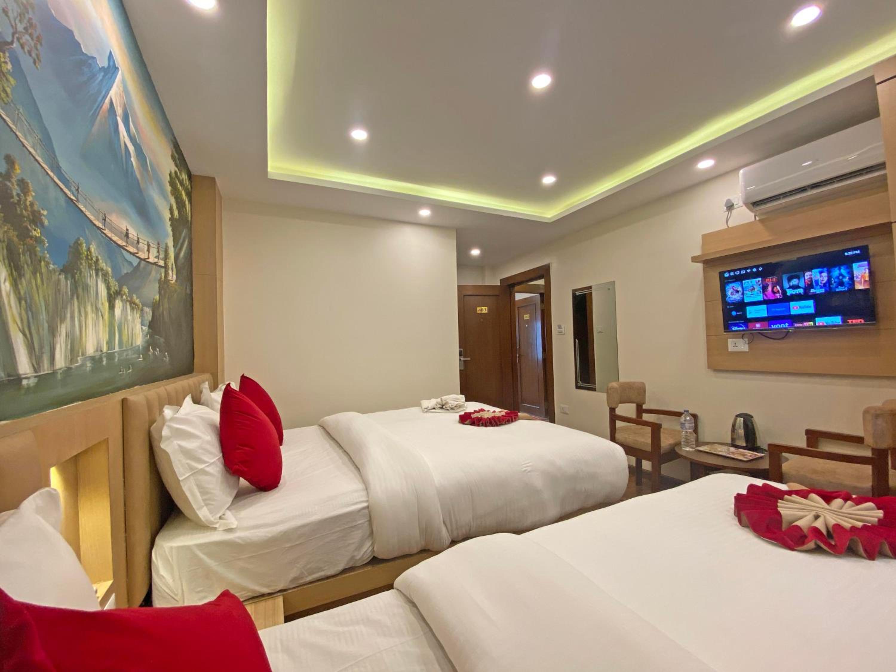 Deluxe Triple Room - Photo 17