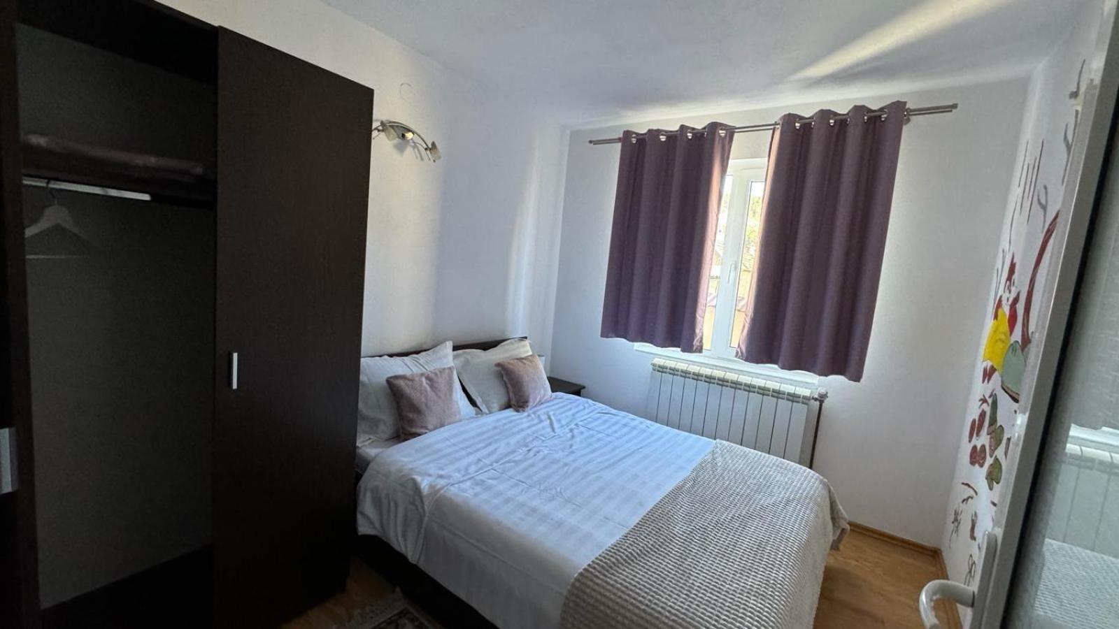 Three-Bedroom Apartment - Photo 18