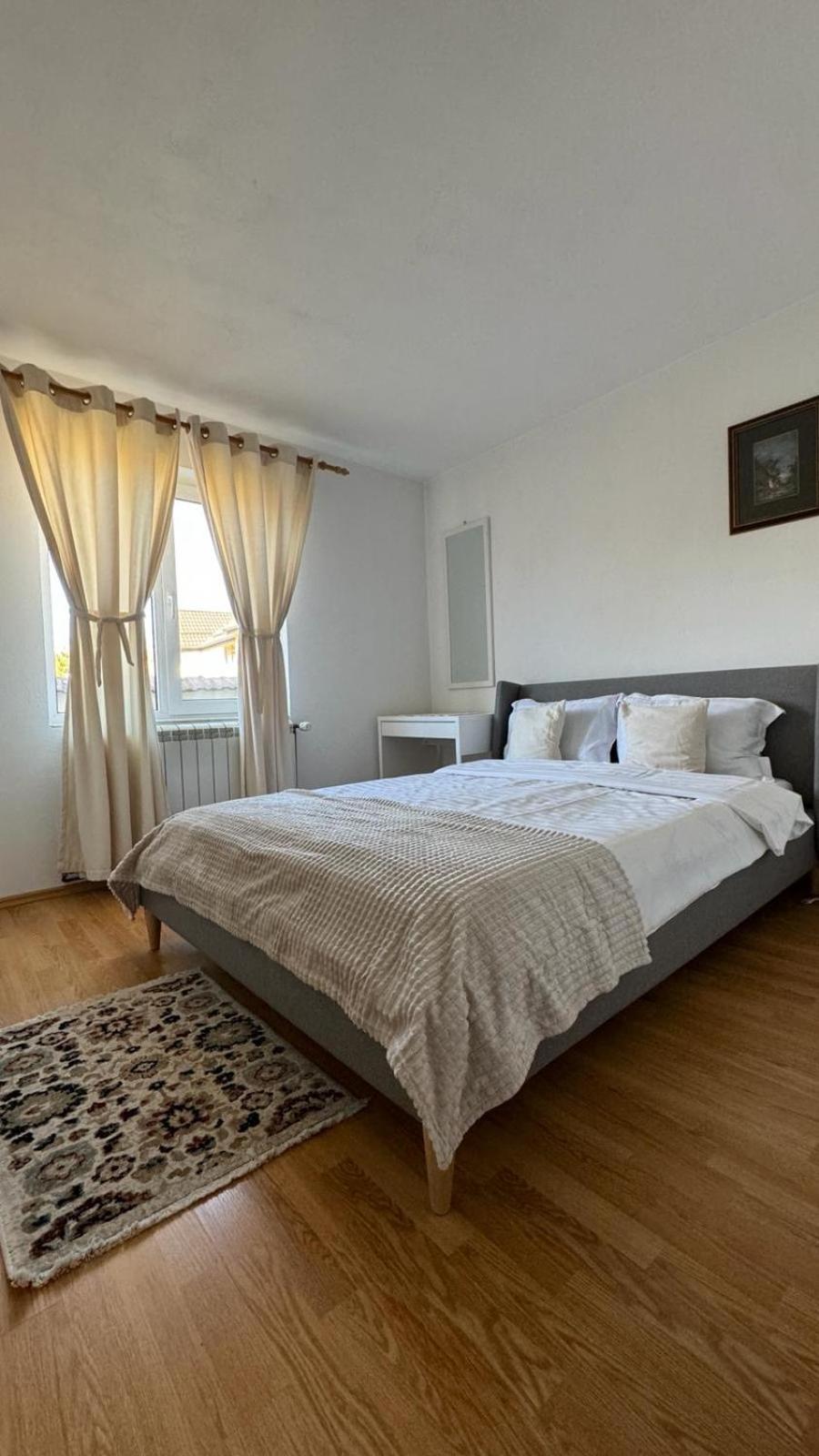 Three-Bedroom Apartment - Photo 2