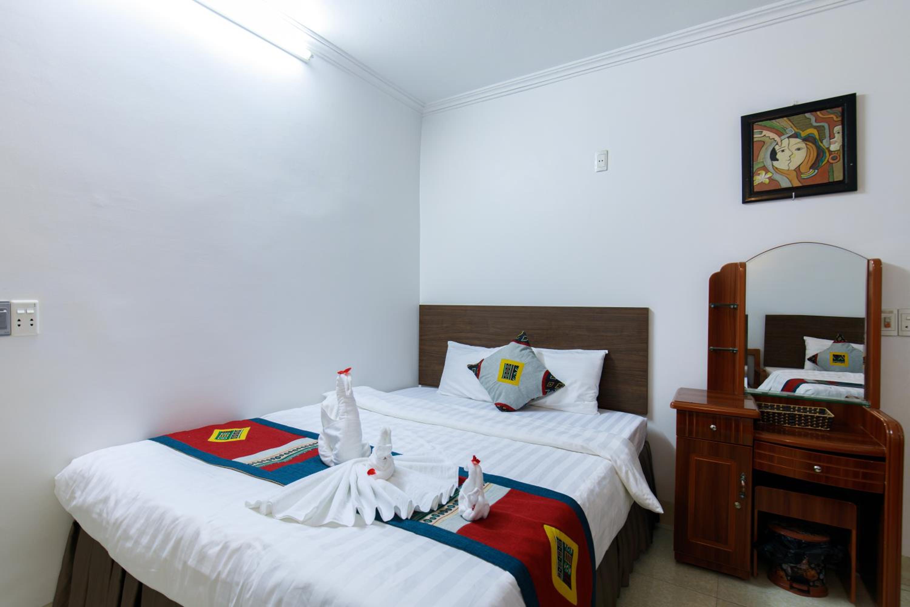 Deluxe Triple Room - Photo 12