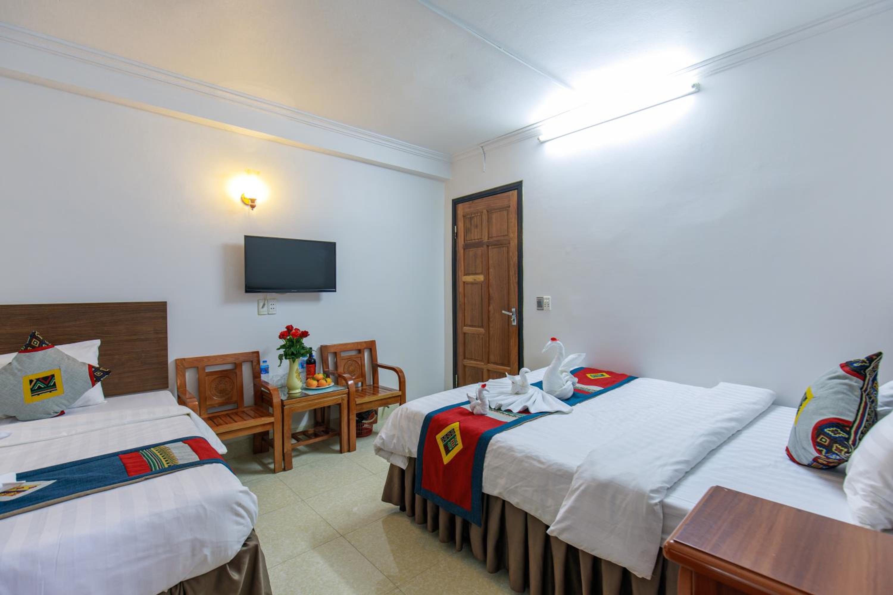 Deluxe Triple Room - Photo 11