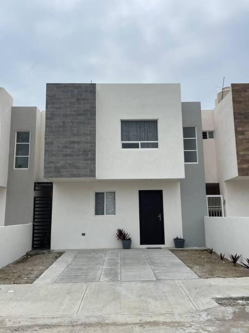 Three-Bedroom House photo 2
