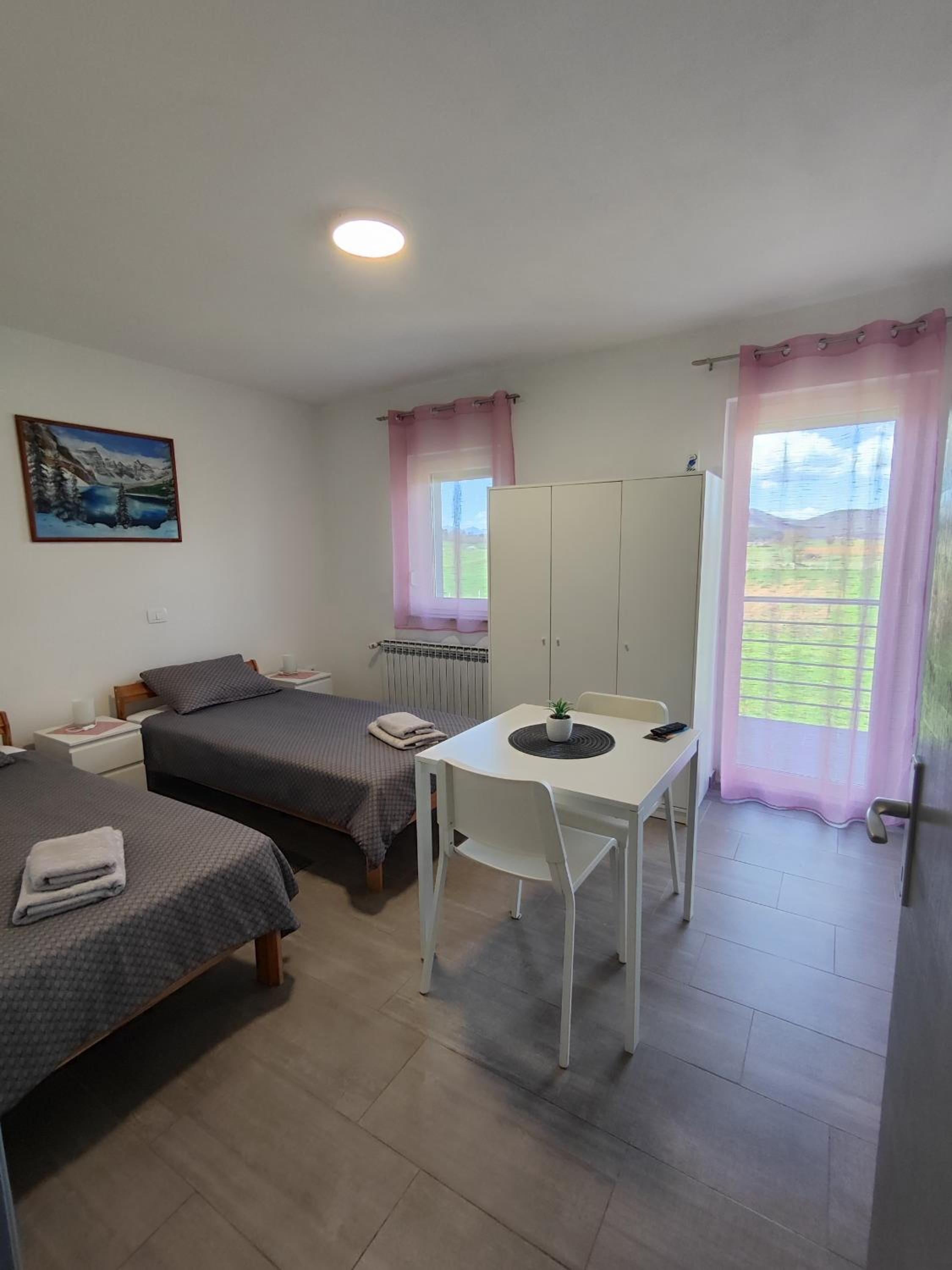 Three-Bedroom Apartment - Photo 1