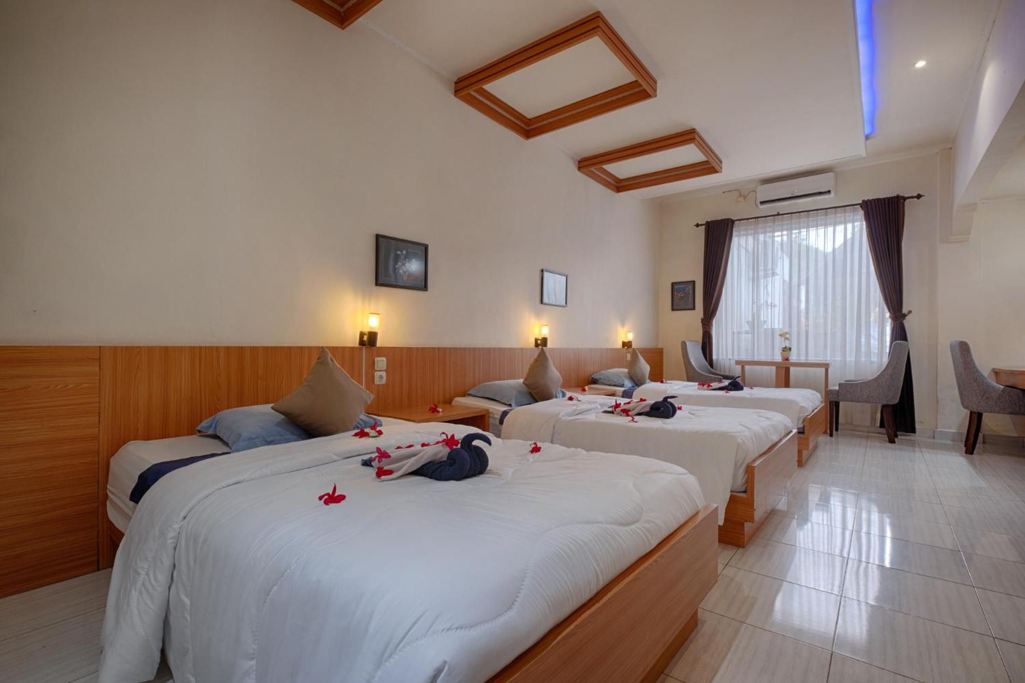Deluxe Triple Room