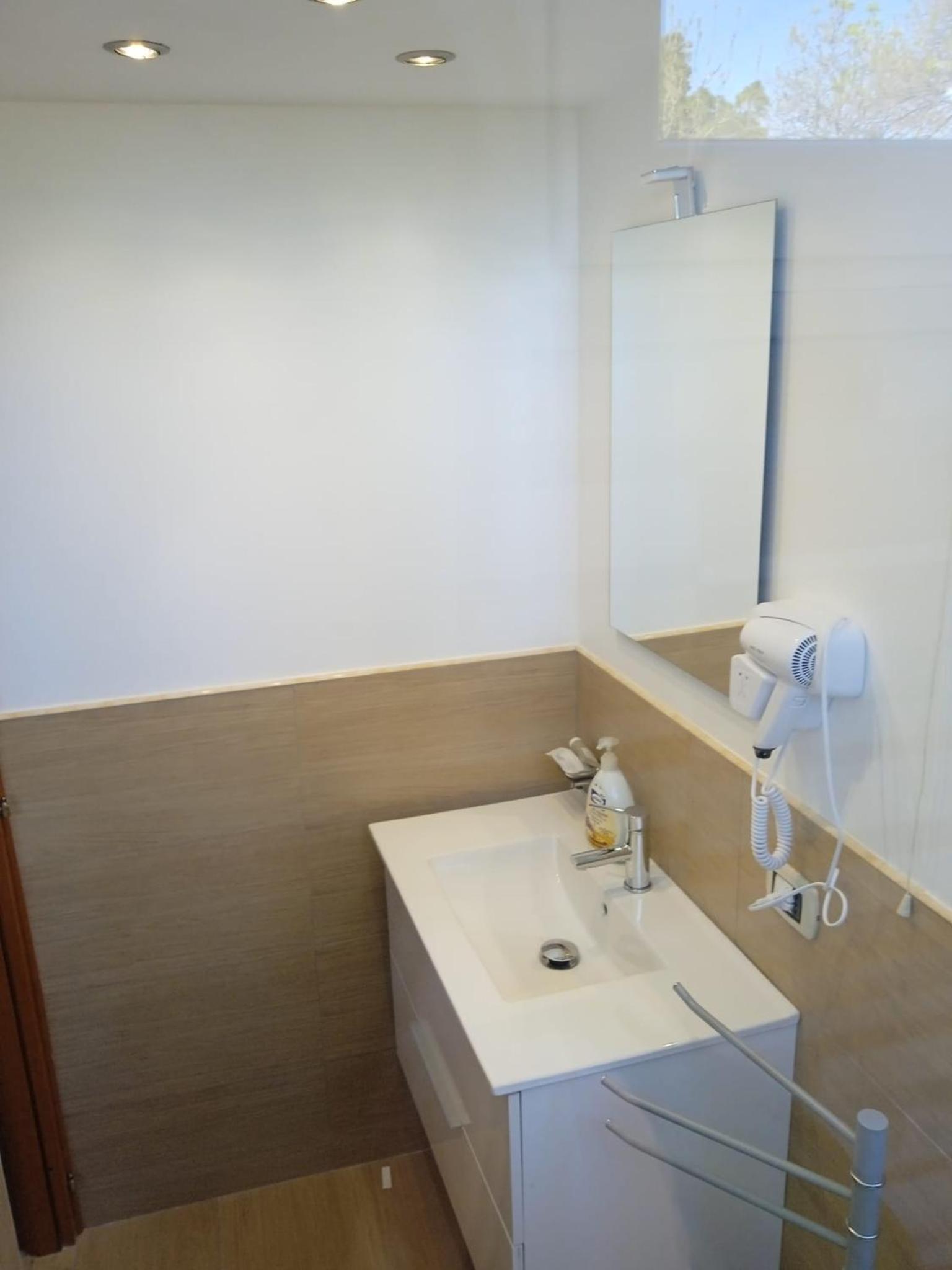 Three-Bedroom House - Photo 29