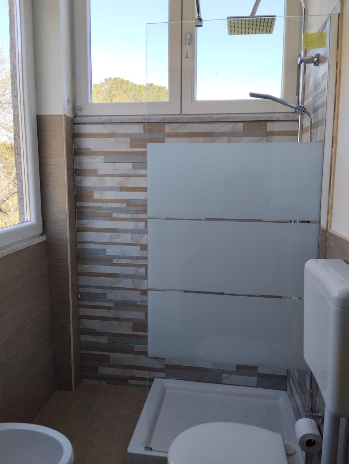 Three-Bedroom House - Photo 28