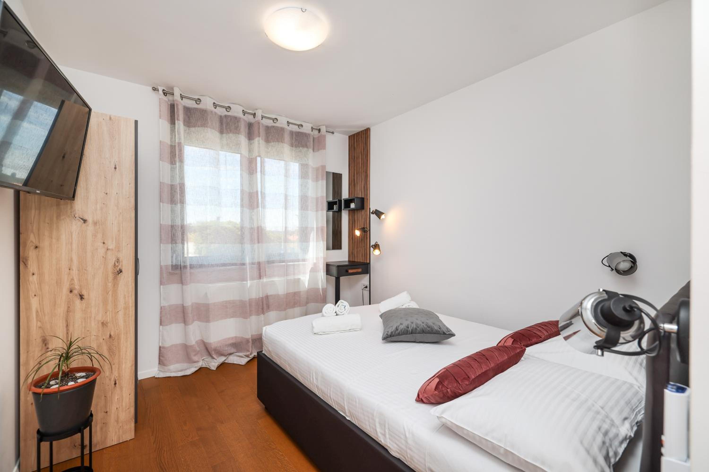Three-Bedroom Apartment - Photo 66