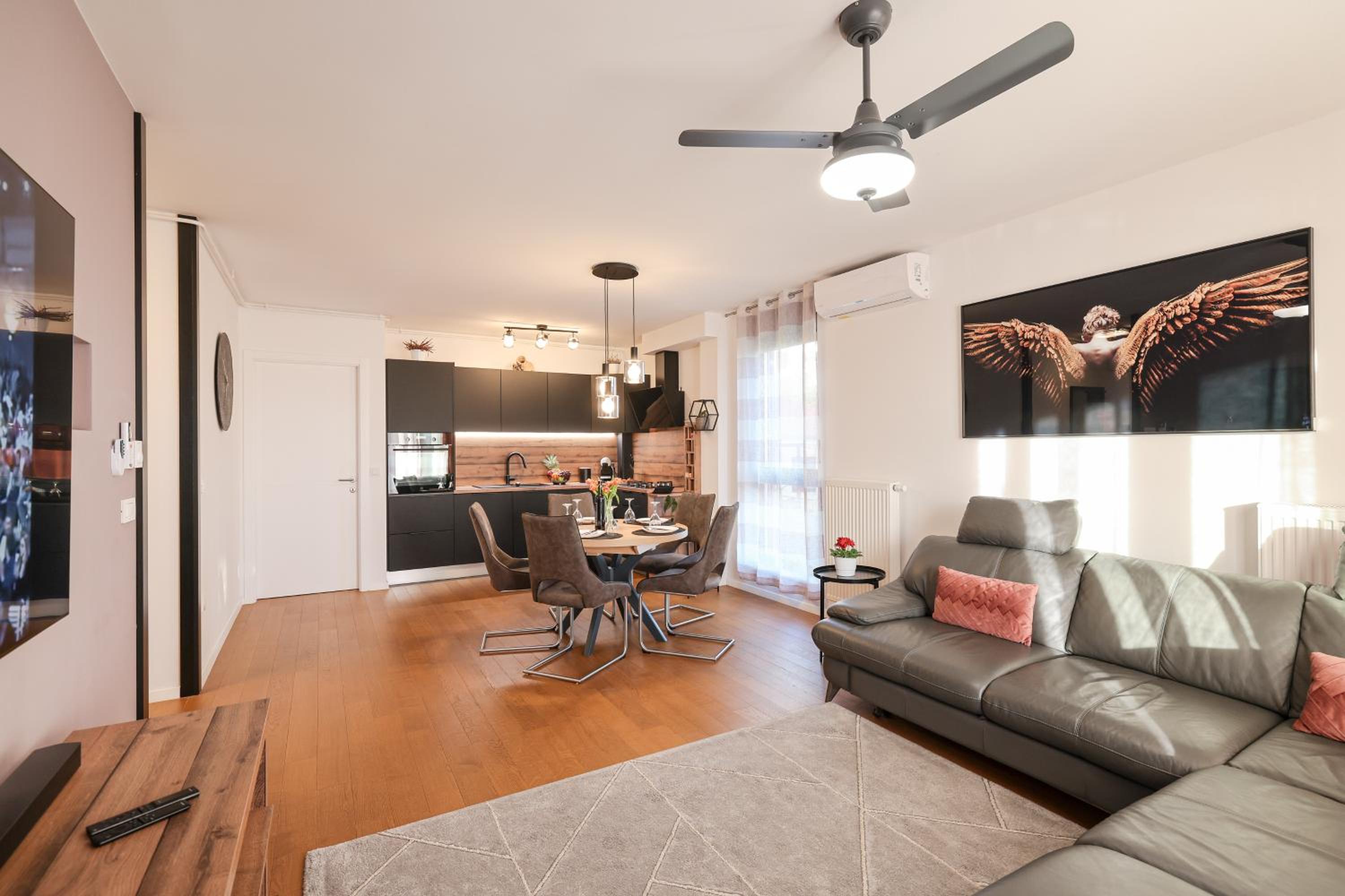 Three-Bedroom Apartment - Photo 52