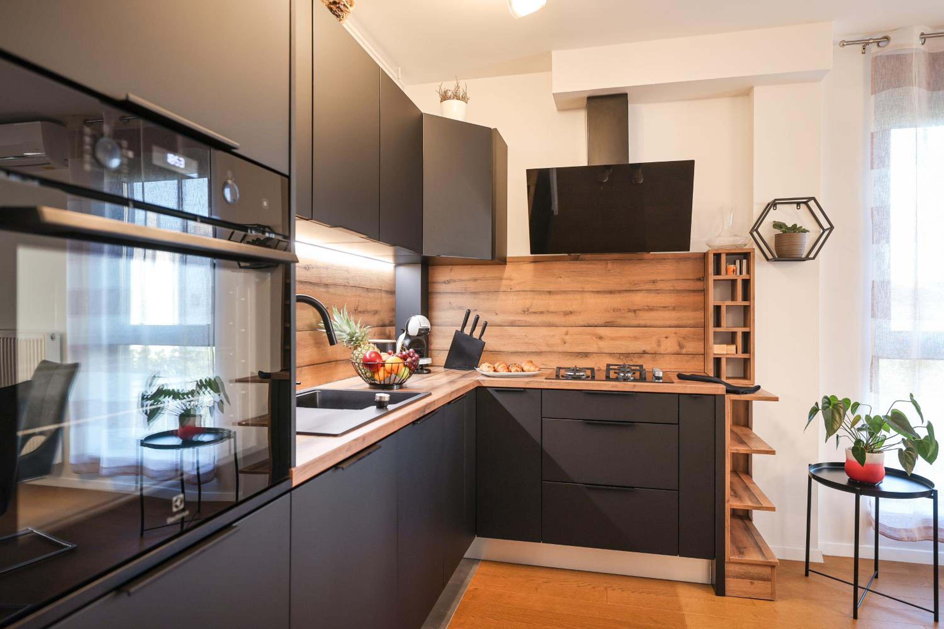 Three-Bedroom Apartment - Photo 32