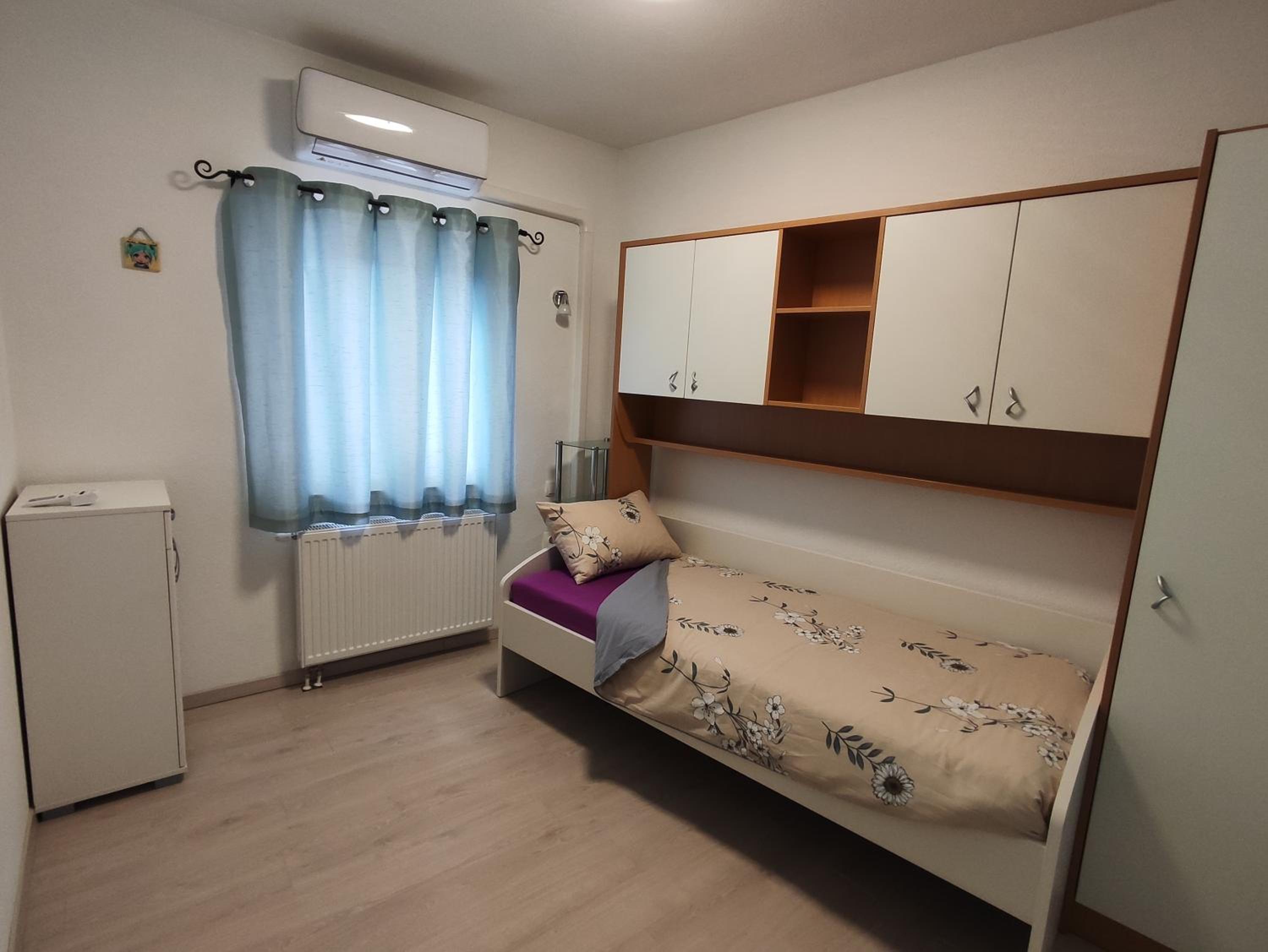 Two-Bedroom Apartment - Photo 14