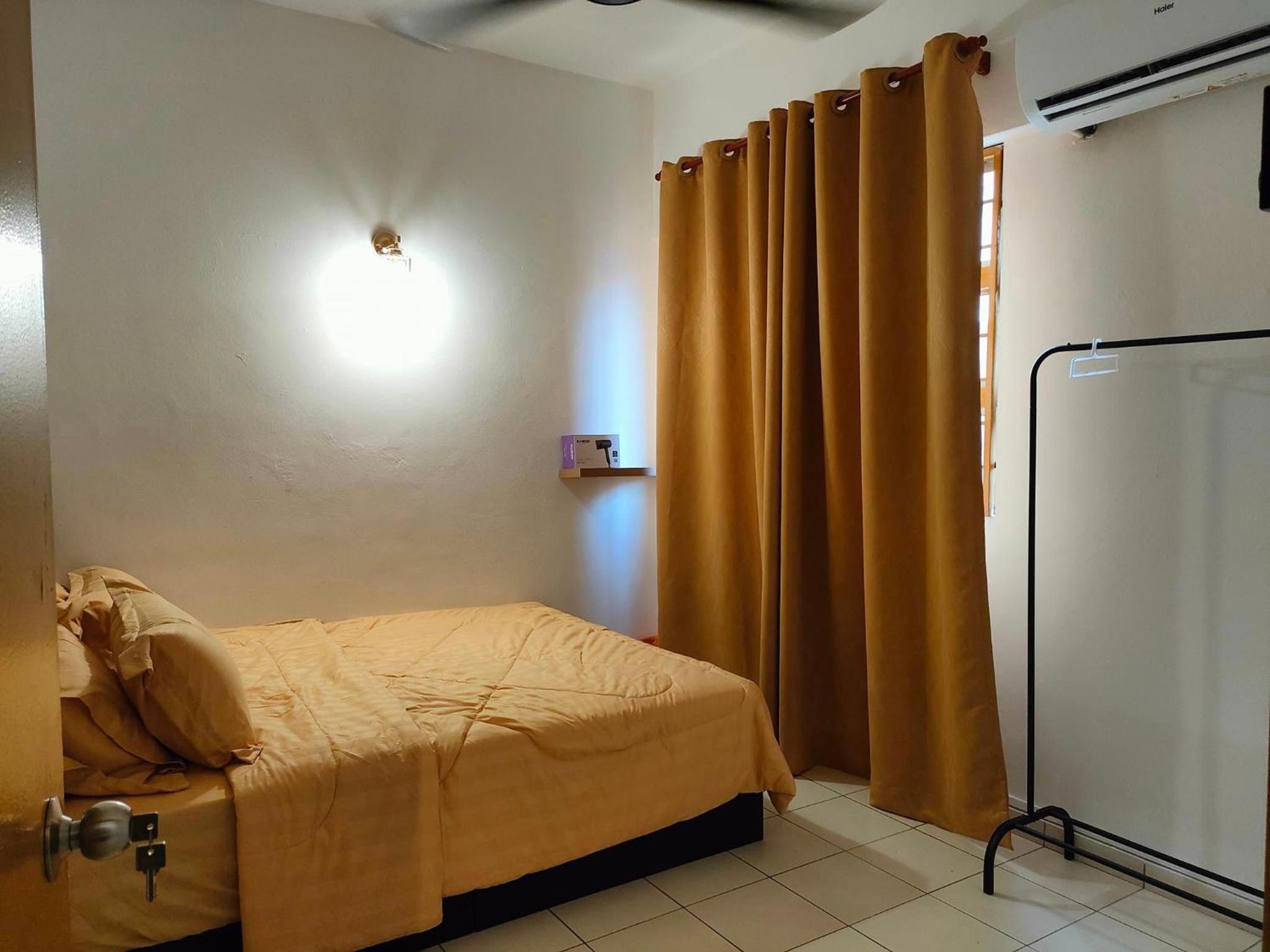 Three-Bedroom Apartment photo 1