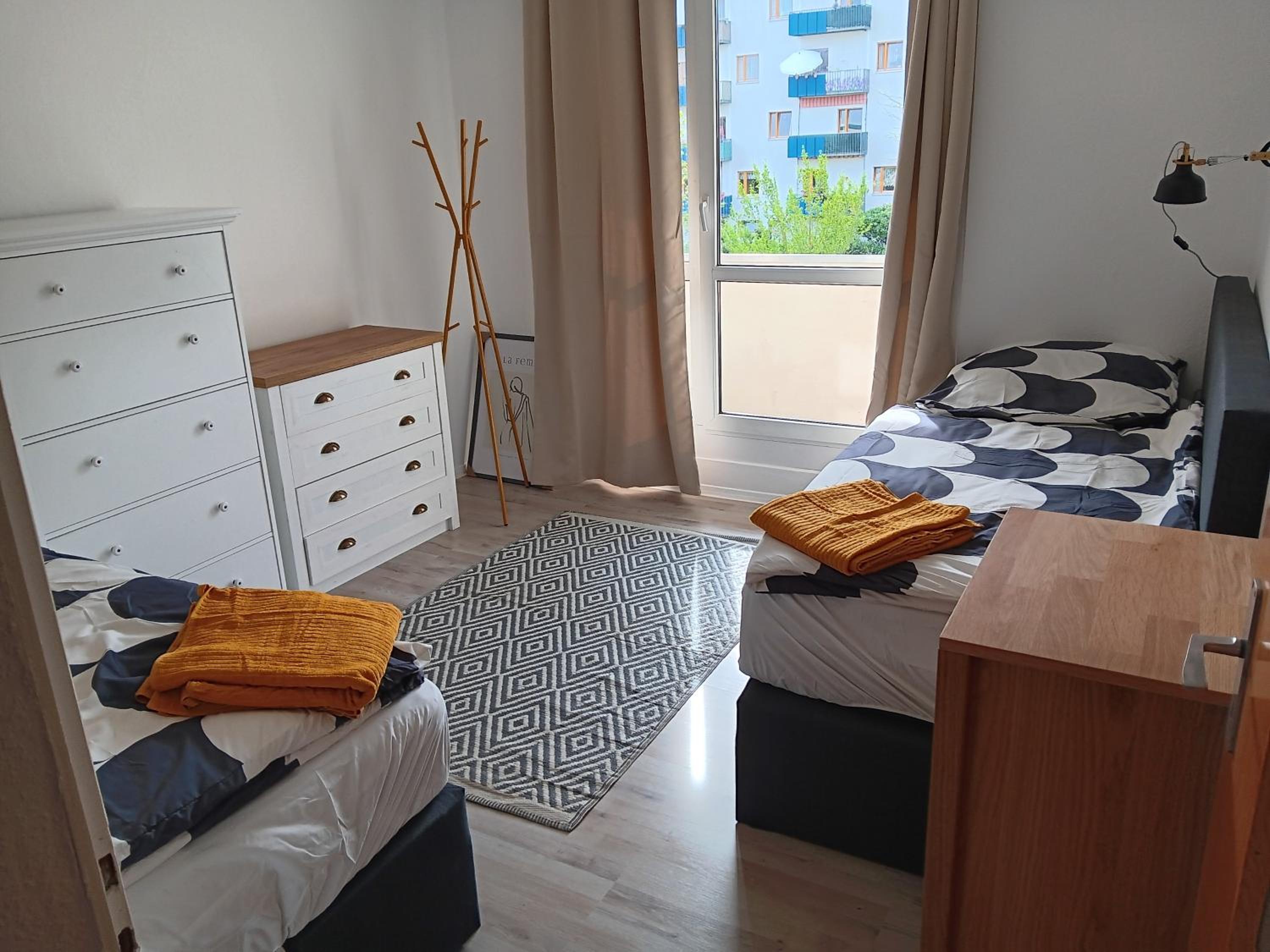 Three-Bedroom Apartment photo 1