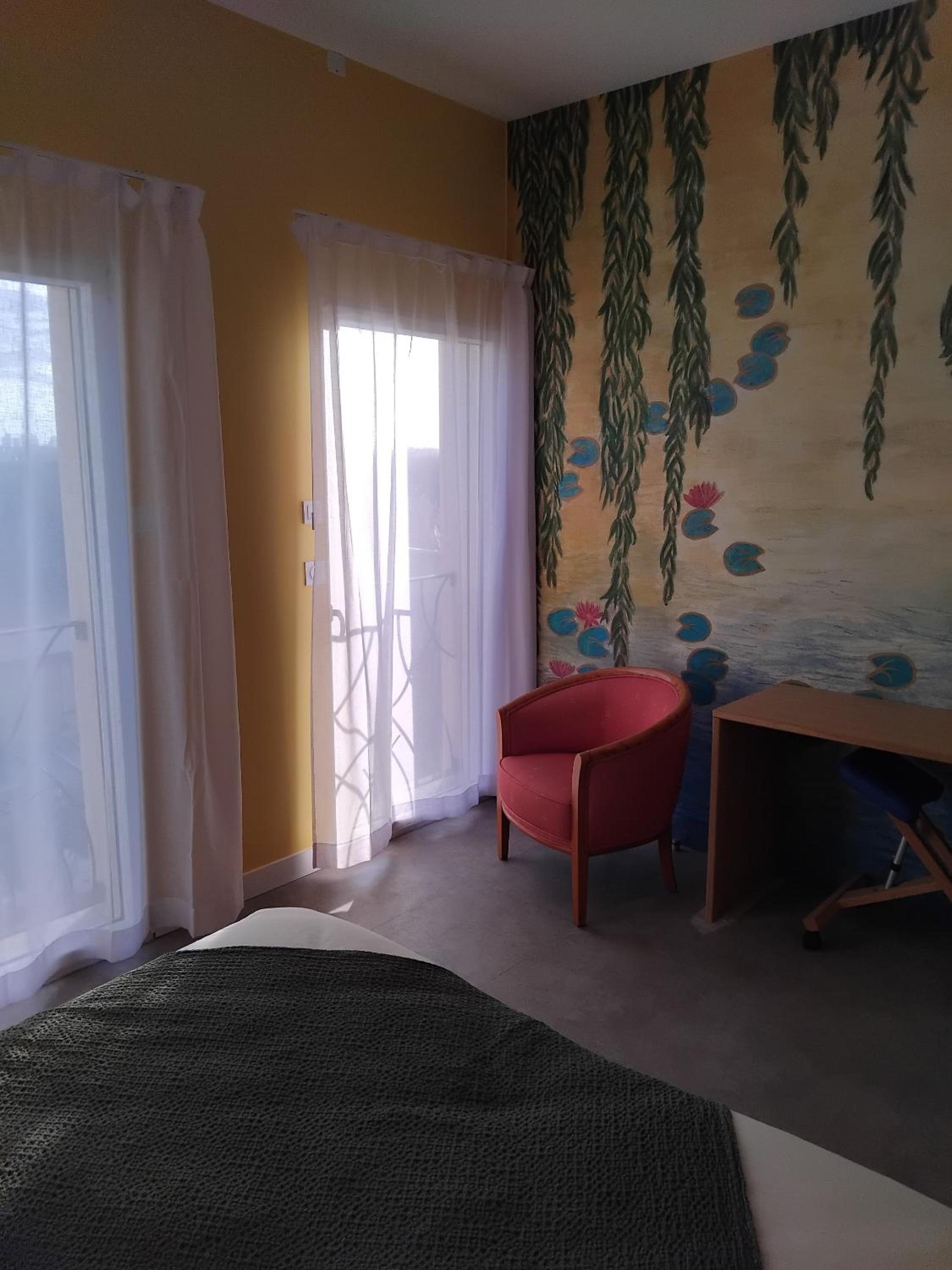 Quadruple Room with Private Bathroom photo 1