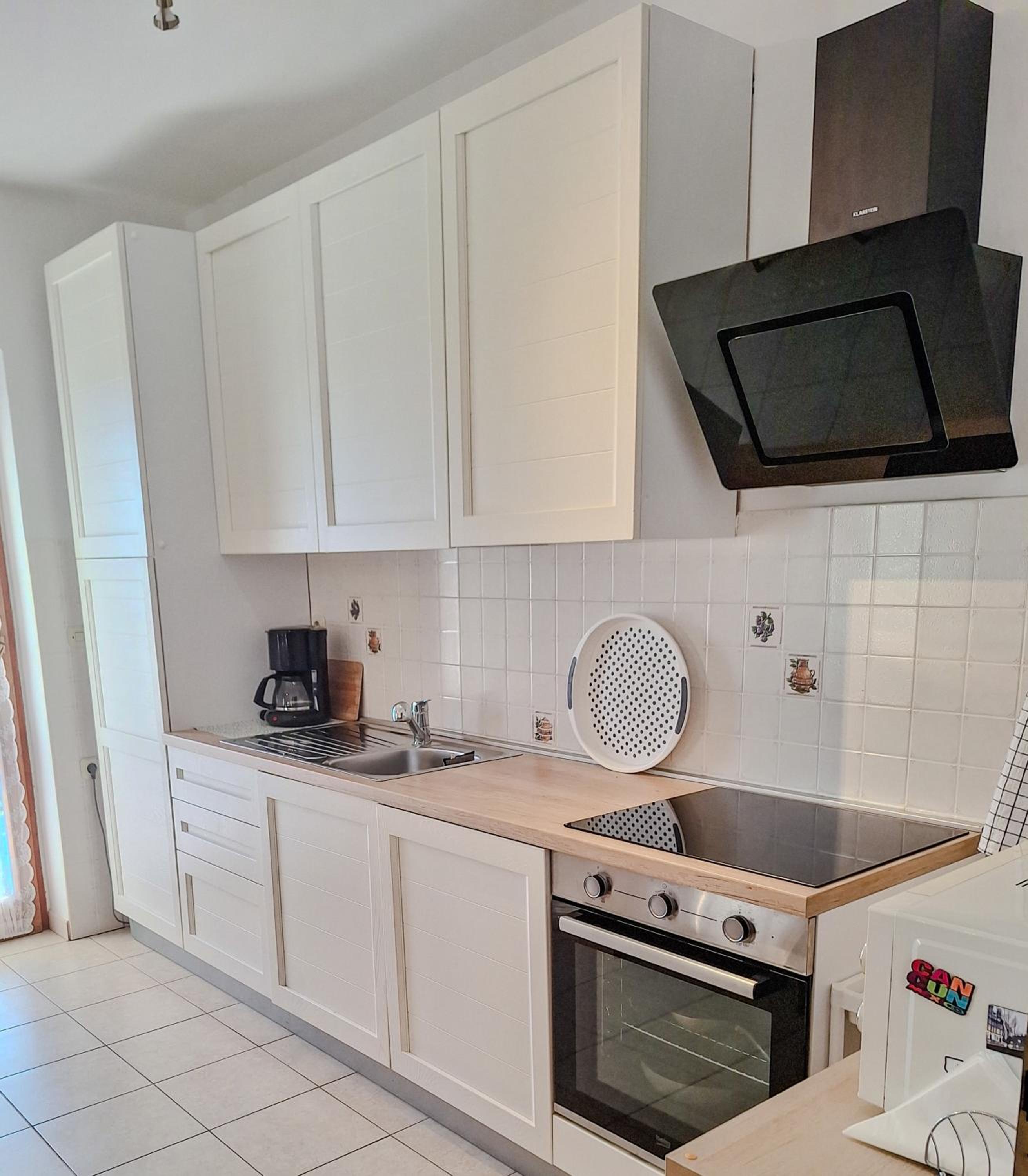 Three-Bedroom Apartment - Photo 25