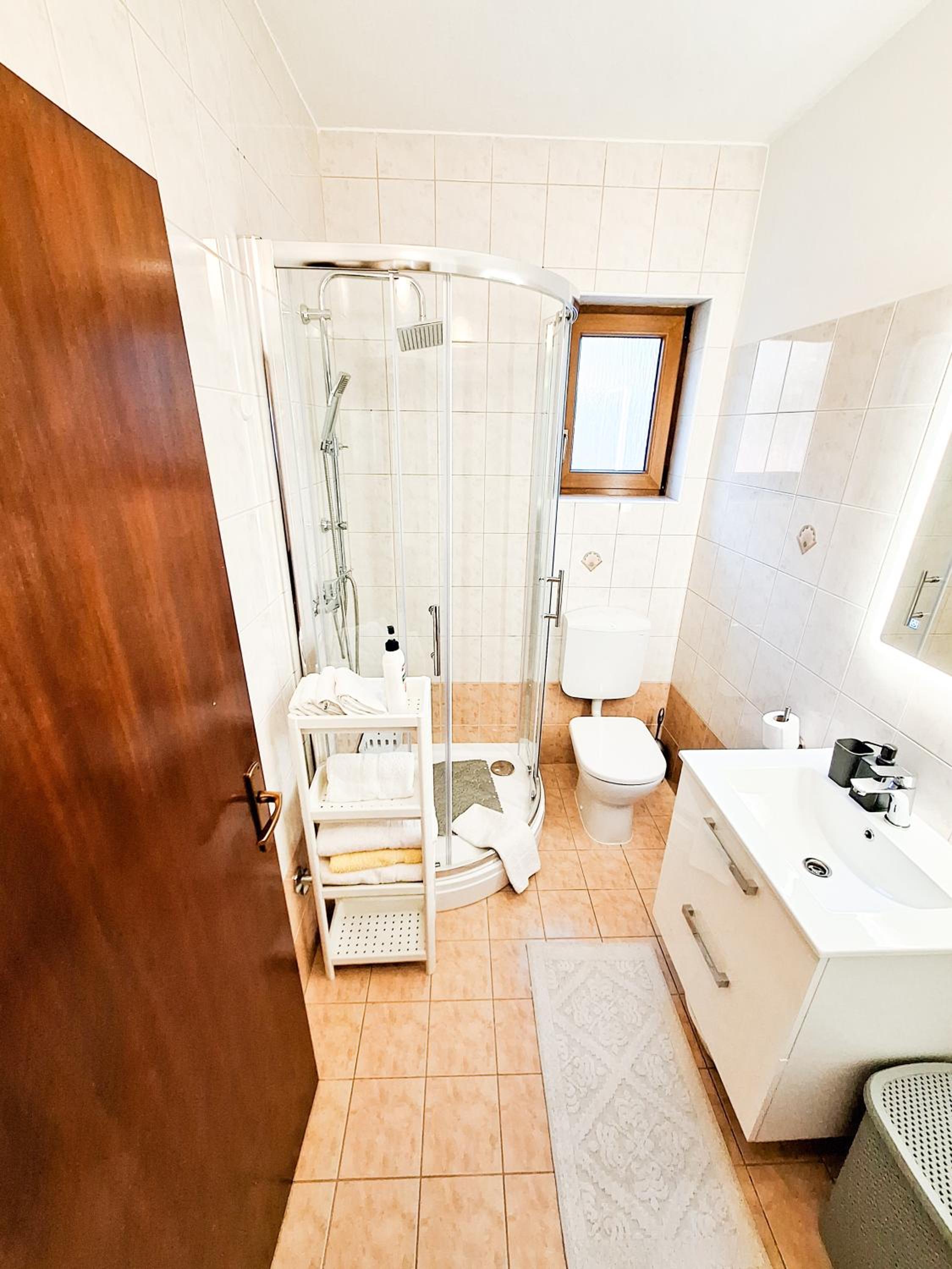 Three-Bedroom Apartment - Photo 35