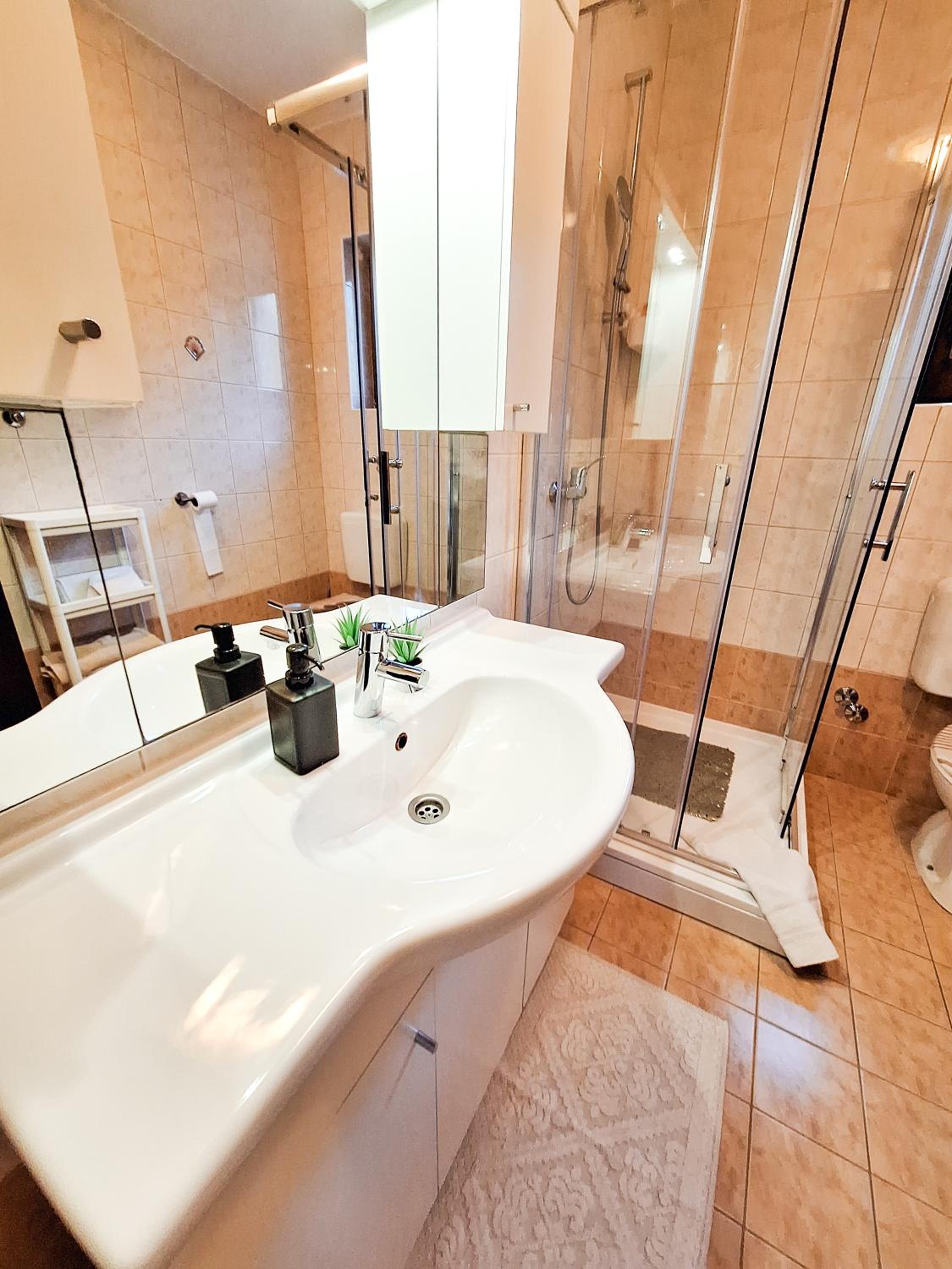 Three-Bedroom Apartment - Photo 36