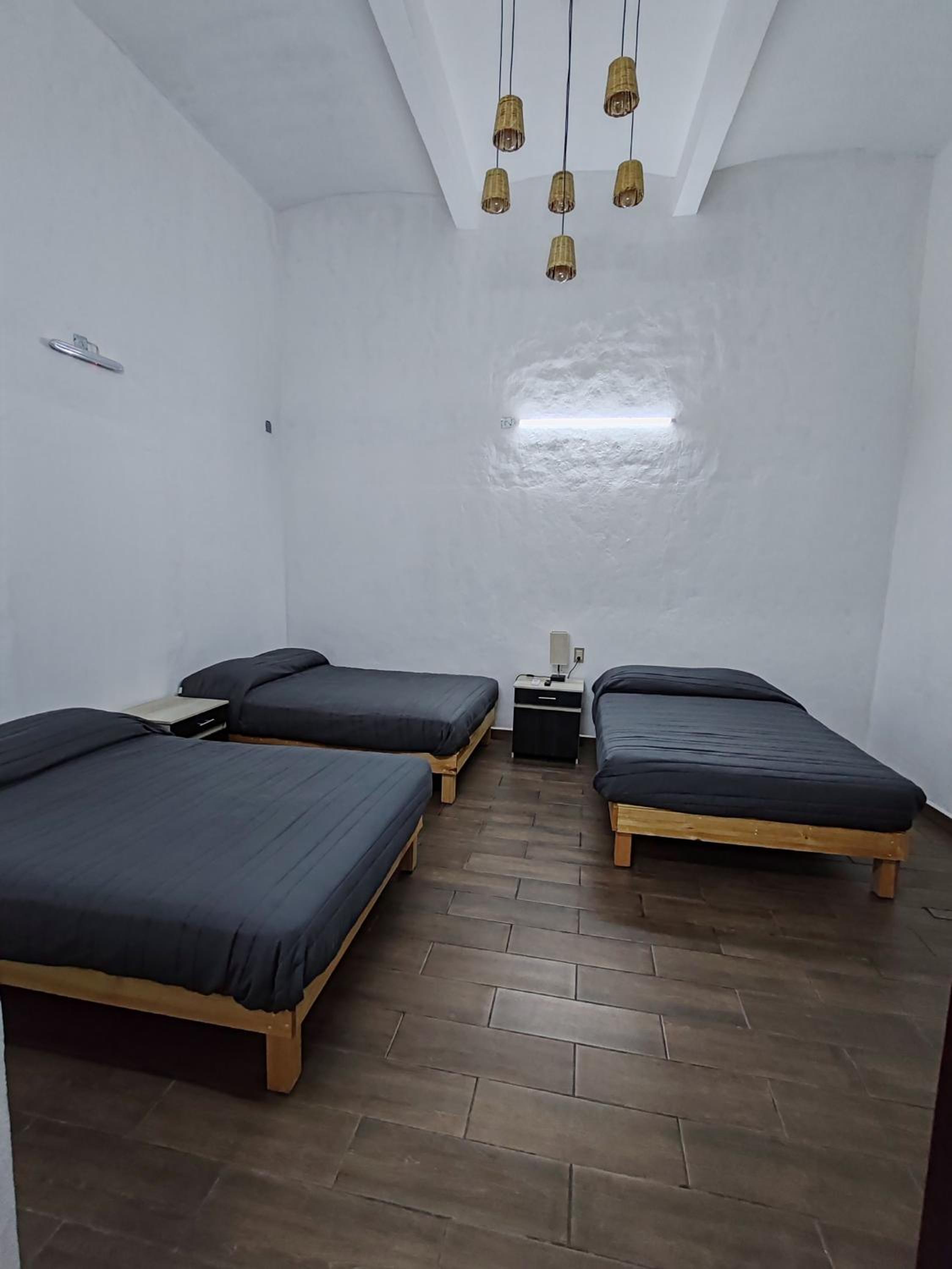 Deluxe Triple Room - Photo 1