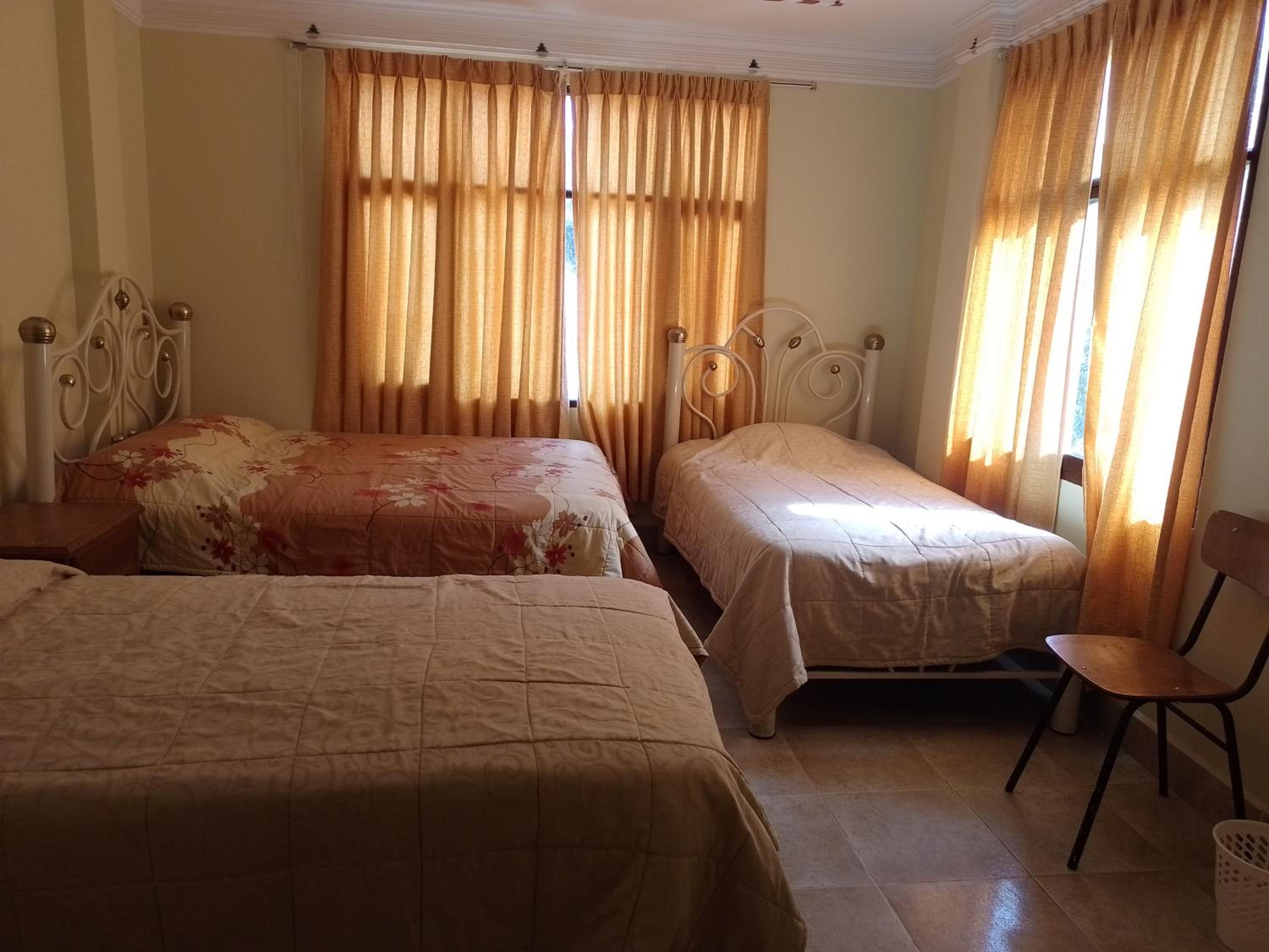 Basic Triple Room With Shared Bathroom