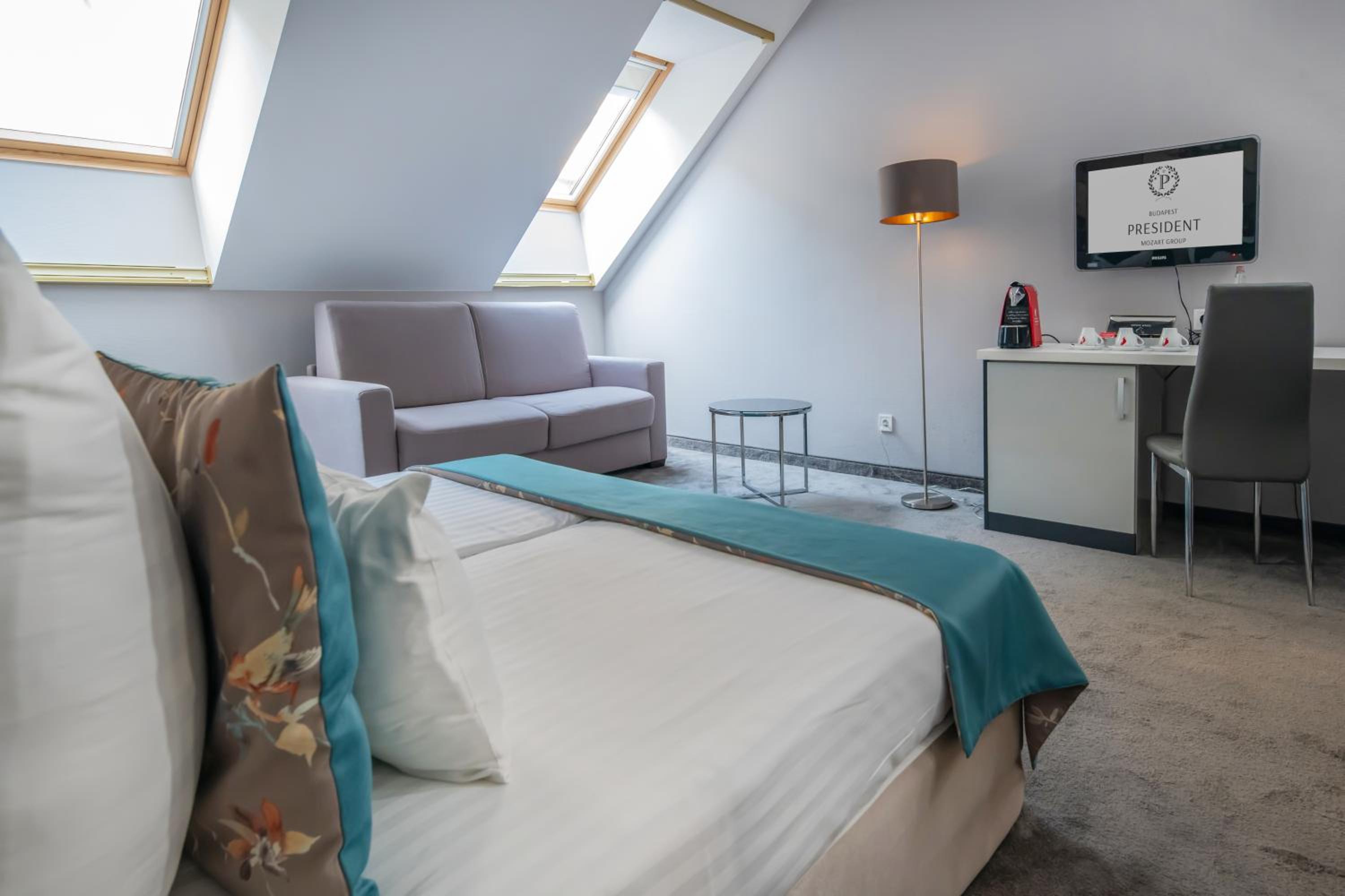 Superior Manzard Room With Sofa