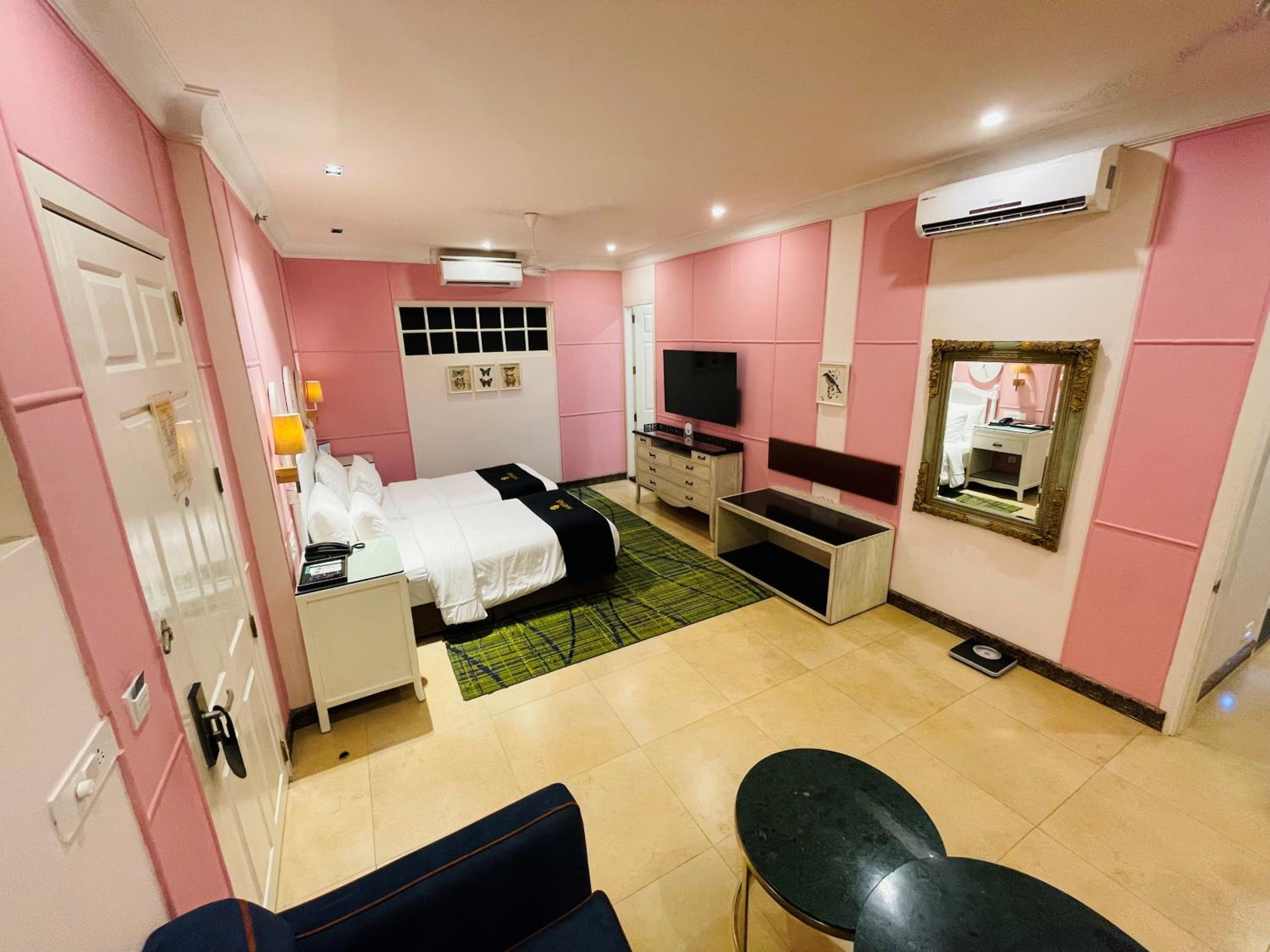 Family Room - 10% Discount on Foods & Soft Beverages* | 15% Discounts on Laundry Services* | INR 500 spa credit during your stay on selective Massage services. TnC Apply.* | Free Mini-bar - 2 cans of soft Beverages (Once on Arrival) Family Room - 10% Discount on Foods & Soft Beverages* | 15% Discounts on Laundry Services* | INR 500 spa credit during your stay on selective Massage services. TnC Apply.* | Free Mini-bar - 2 cans of soft Beverages (Once on Arrival)