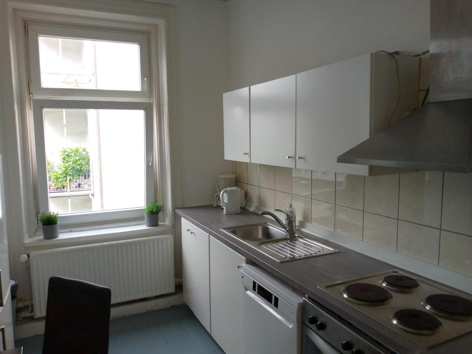Three-Bedroom Apartment - Photo 22
