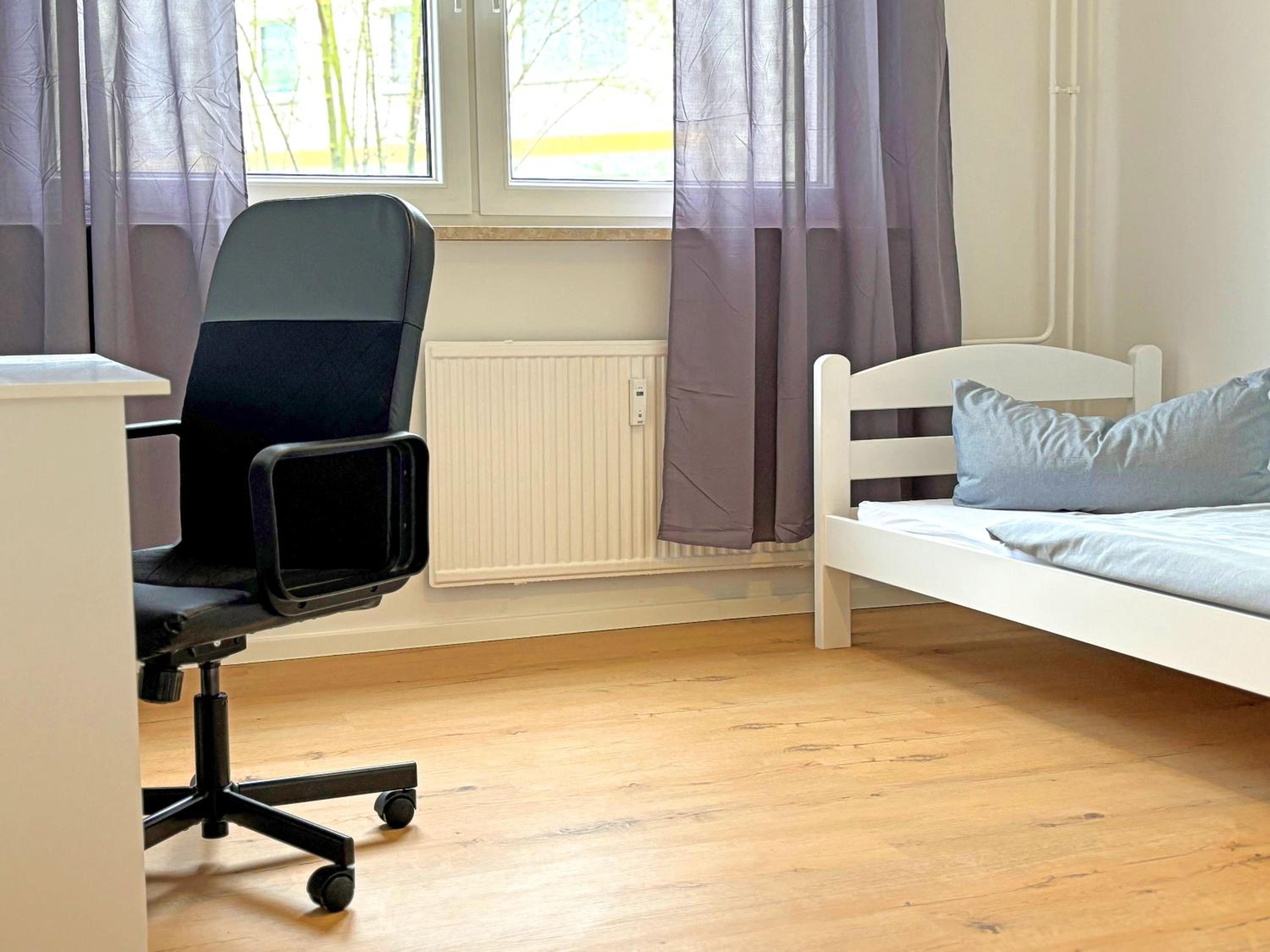 Three-Bedroom Apartment with Balcony photo 3