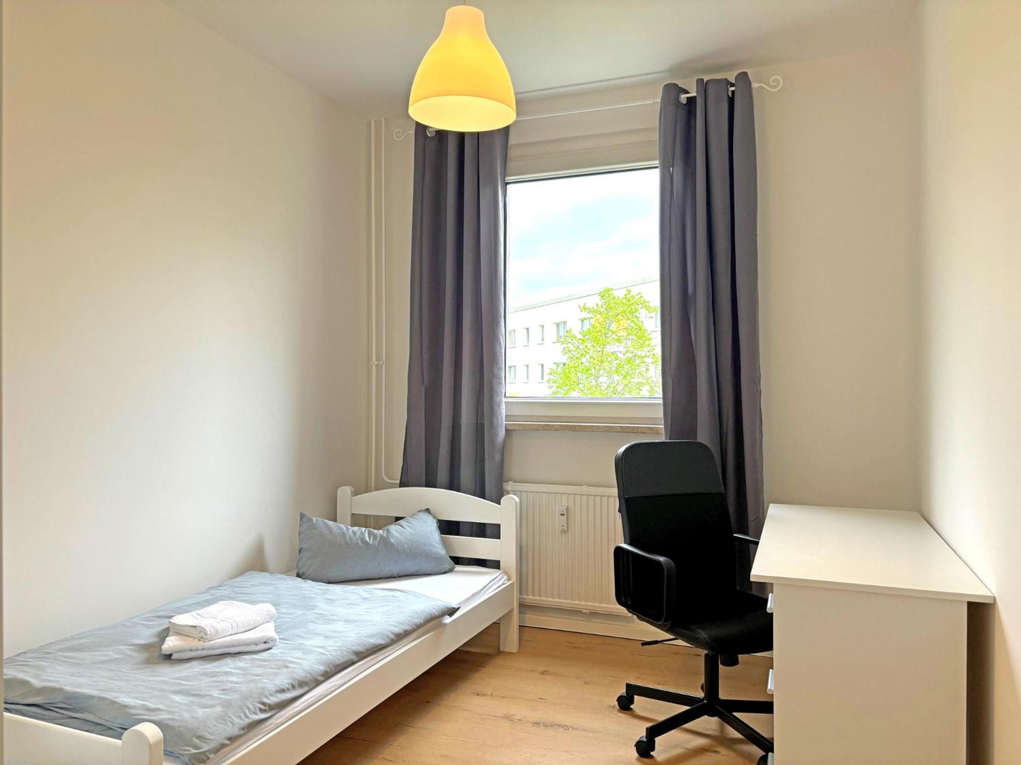 Three-Bedroom Apartment with Balcony photo 2