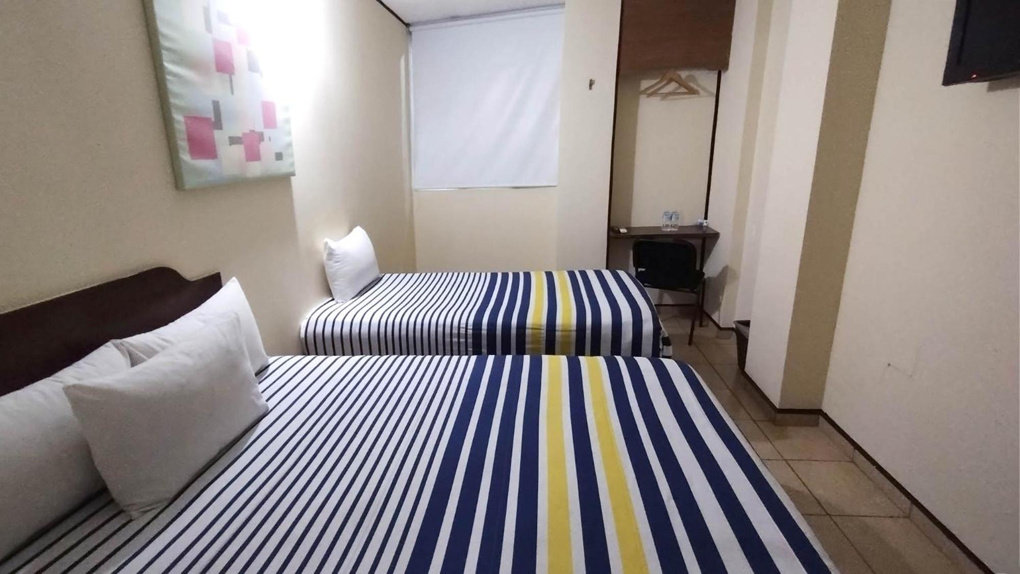 Standard Triple Room - Photo 1