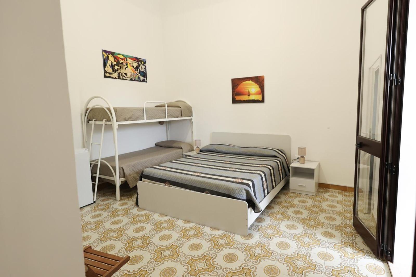 Quadruple Room With Balcony - Courtyard View