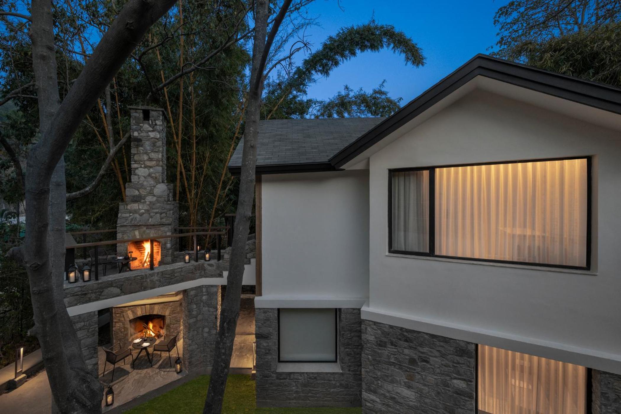 Cottage With Outdoor Fireplace And Patio
