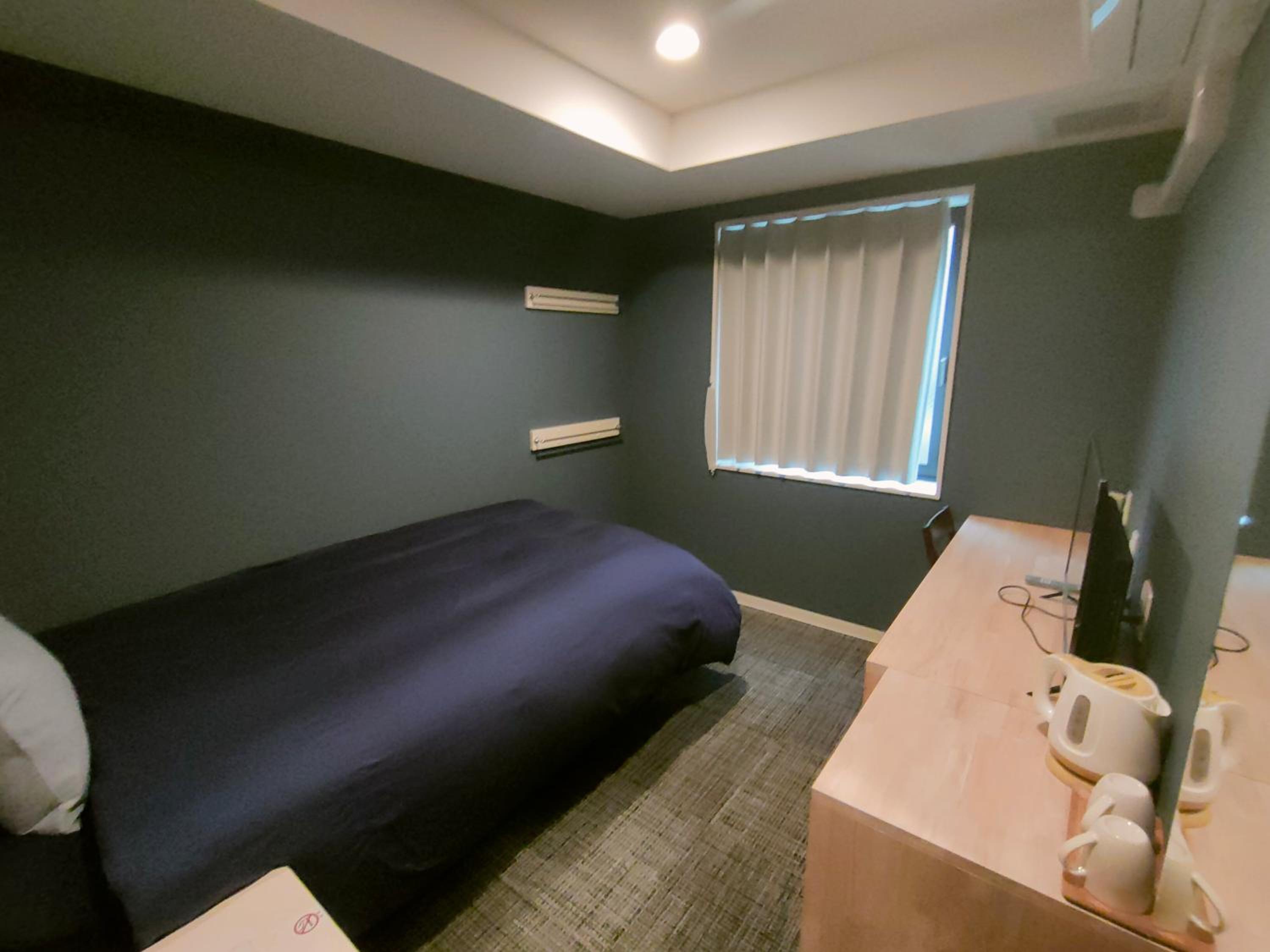 Standard Single Room with Shower photo 2