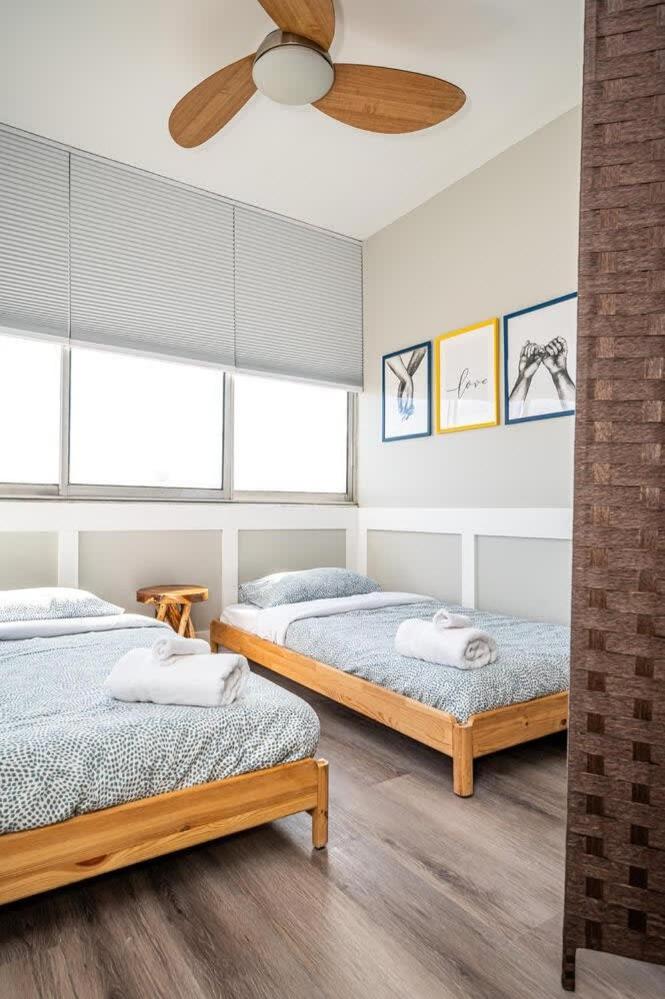 Three-Bedroom Apartment - Photo 26