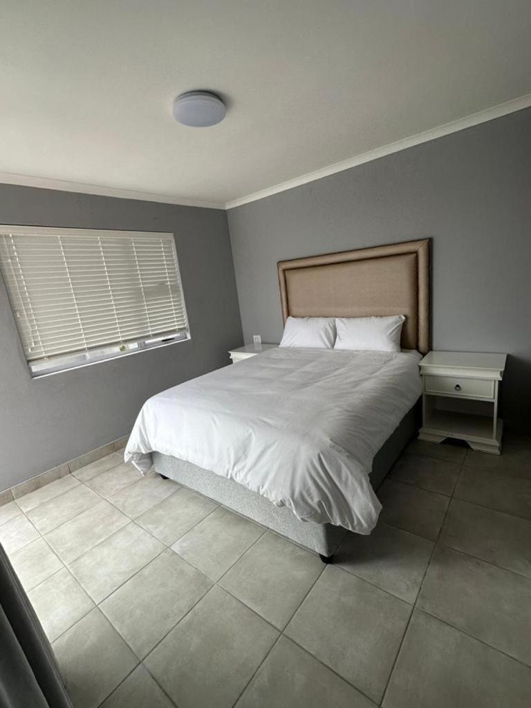 Three-Bedroom Apartment photo 1