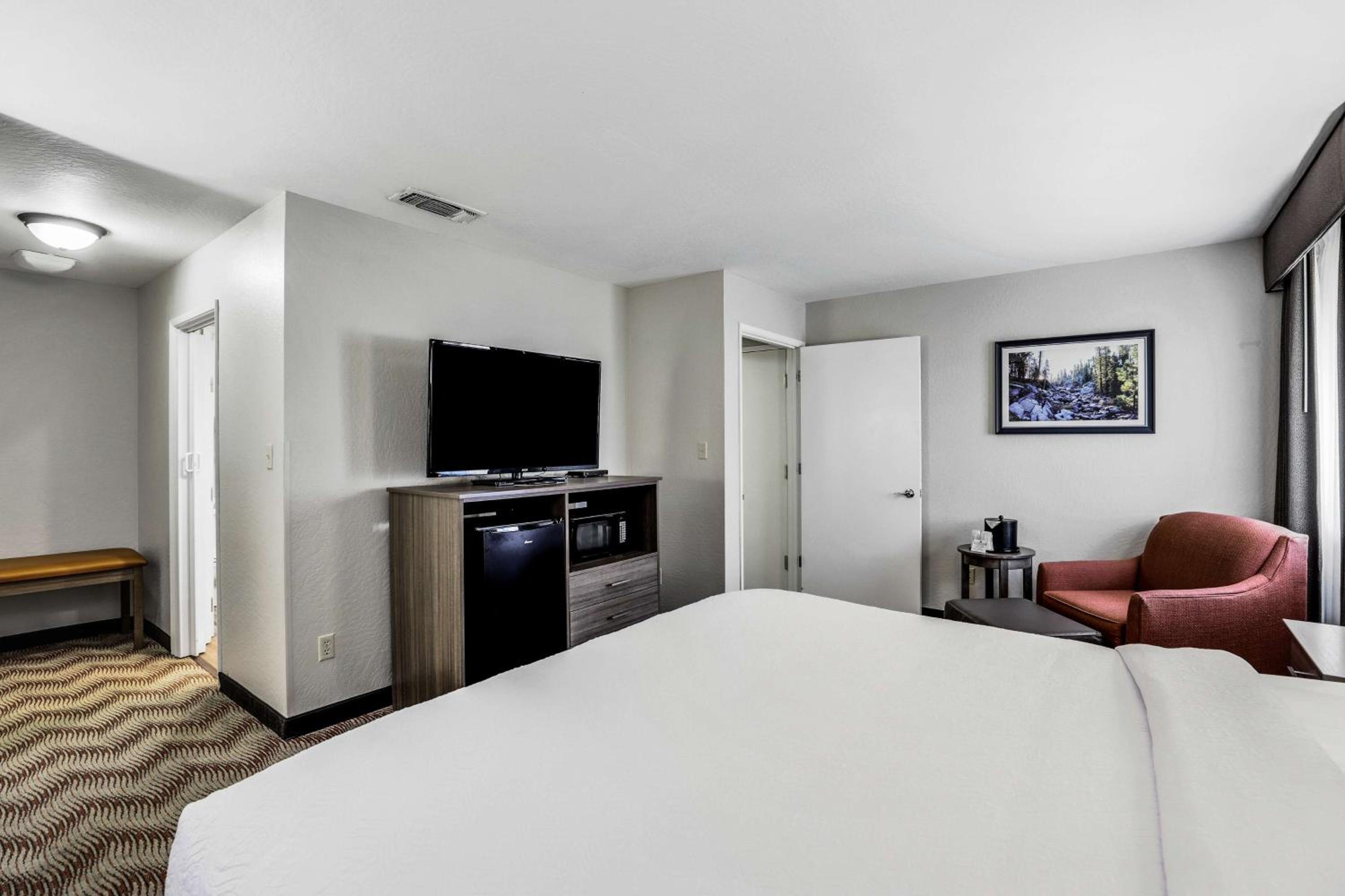 King Suite with One King Bed and One Queen Bed - Non-Smoking - Photo 1