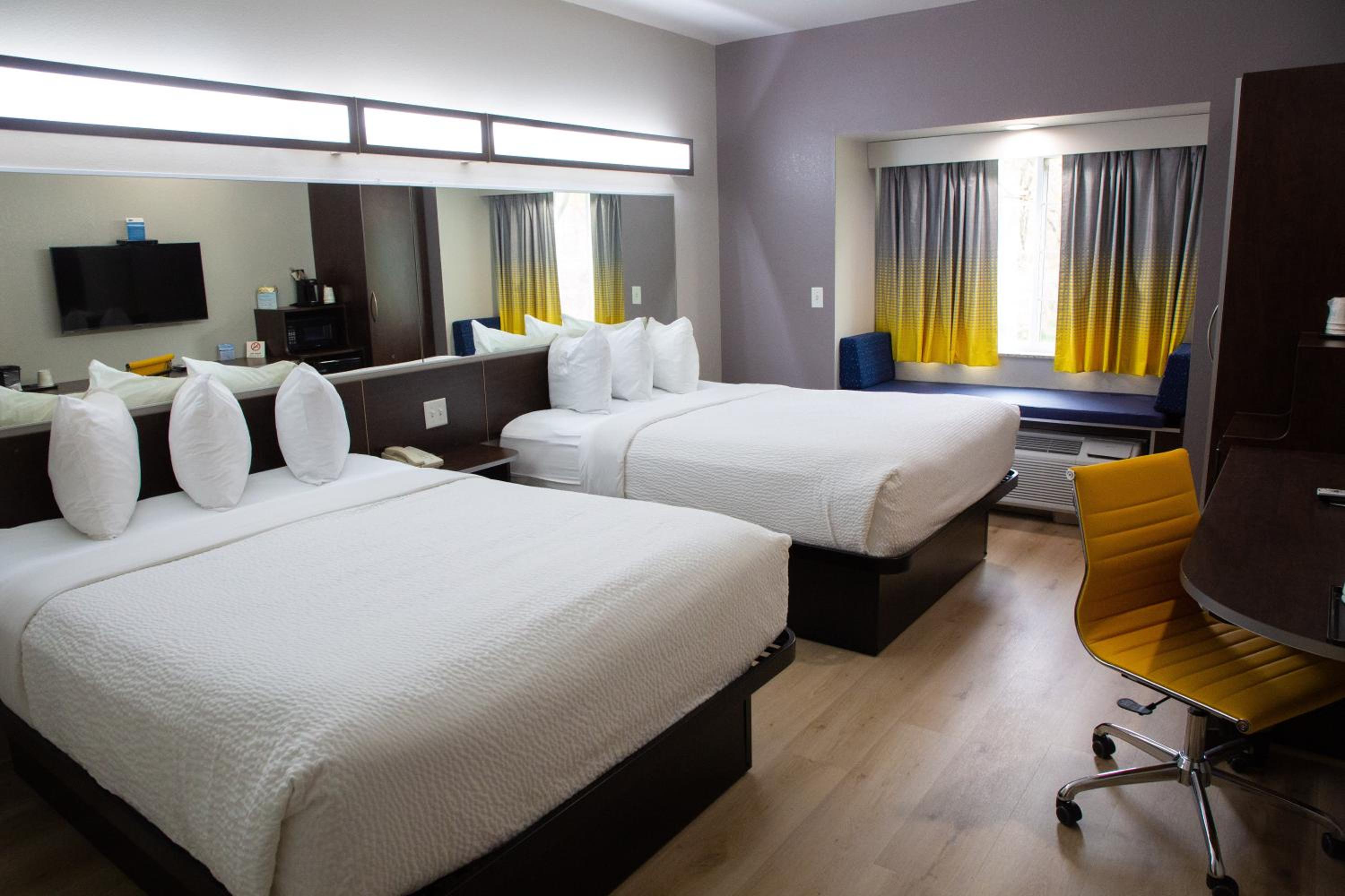 Deluxe Queen Room with Two Queen Beds - Pet Friendly/Non-Smoking - Photo 1
