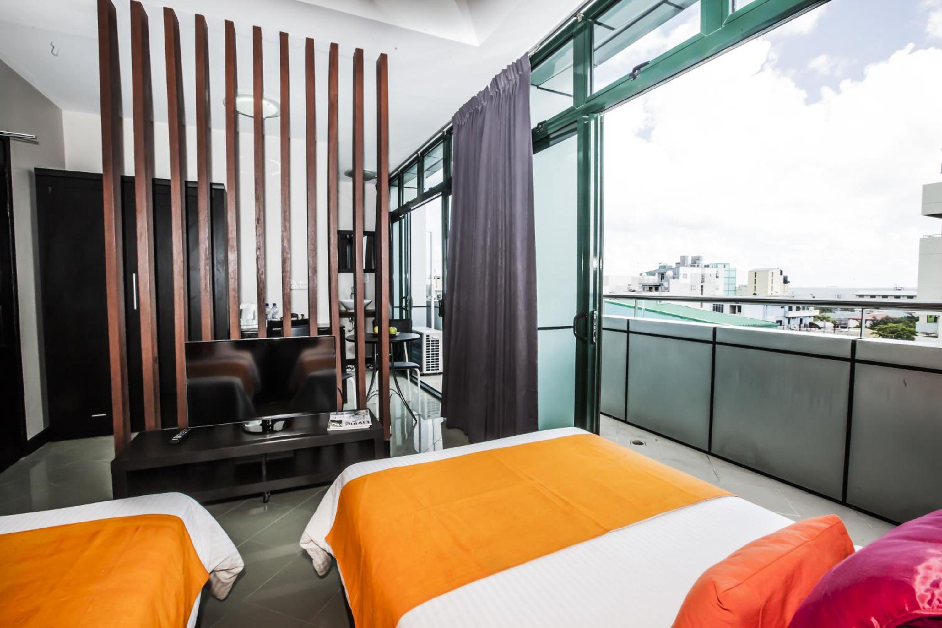 Deluxe Double or Twin Room (Free Return Airport Transfer and 10% off on Food & Beverage)