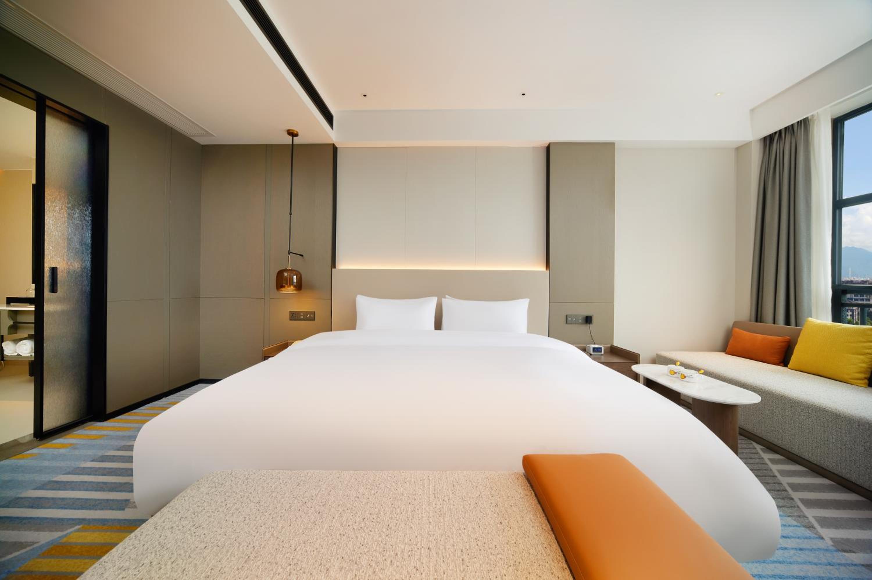 Two-Bedroom Suite with One King Bed, Two Twin Beds and Living Area - Kids Theme photo 2