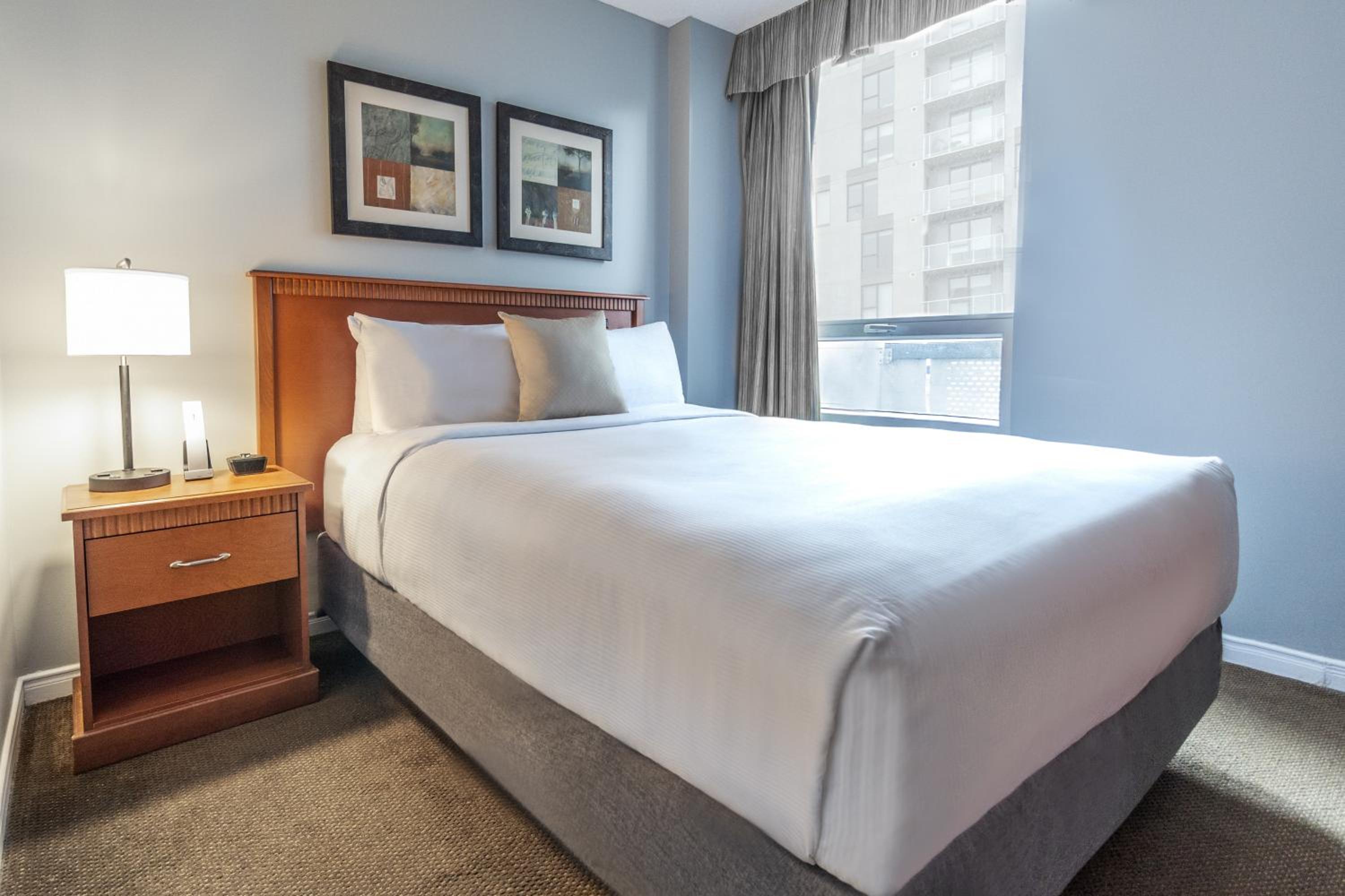 One Queen Suite with Balcony - Photo 1