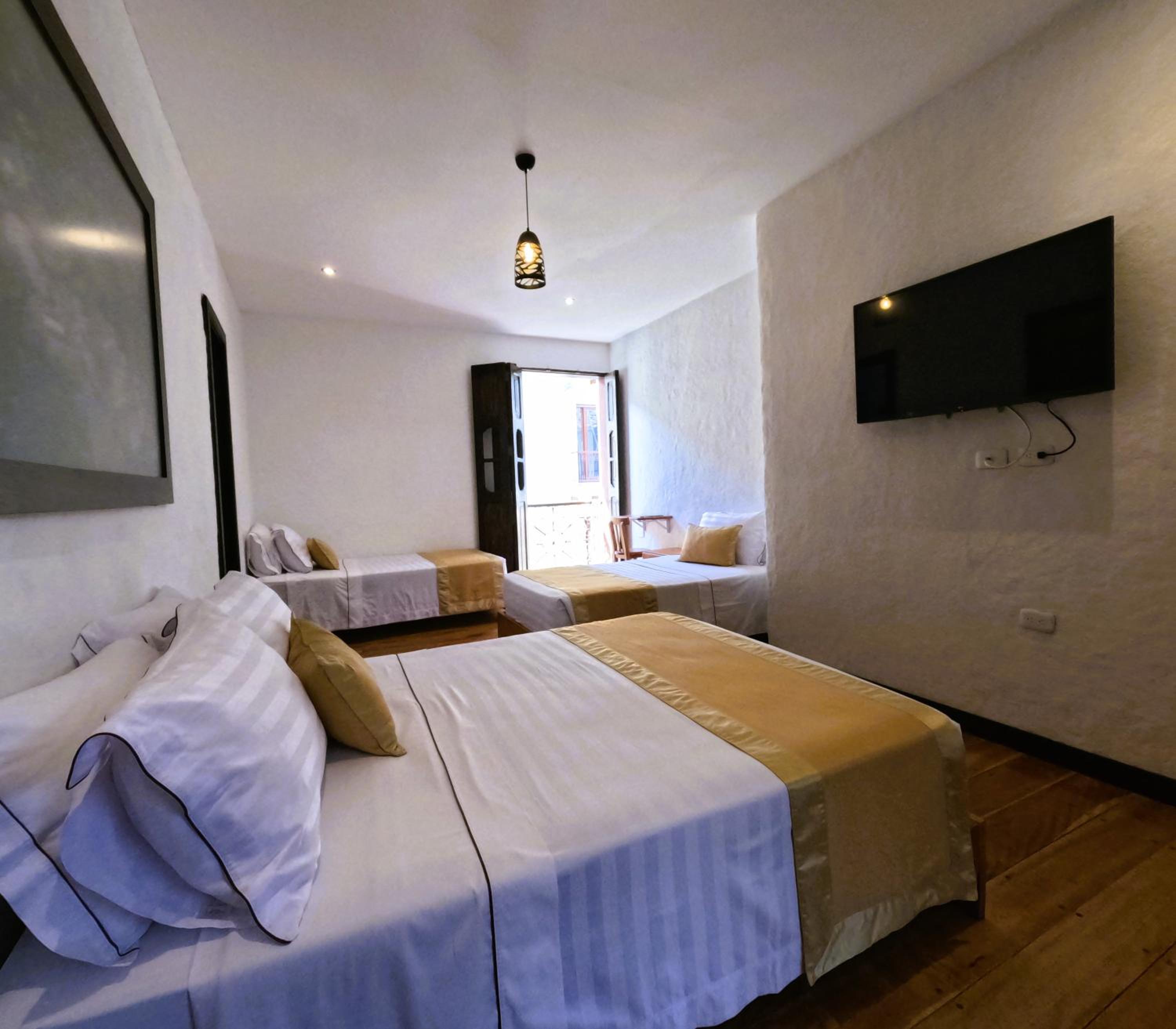 Triple Room with Balcony