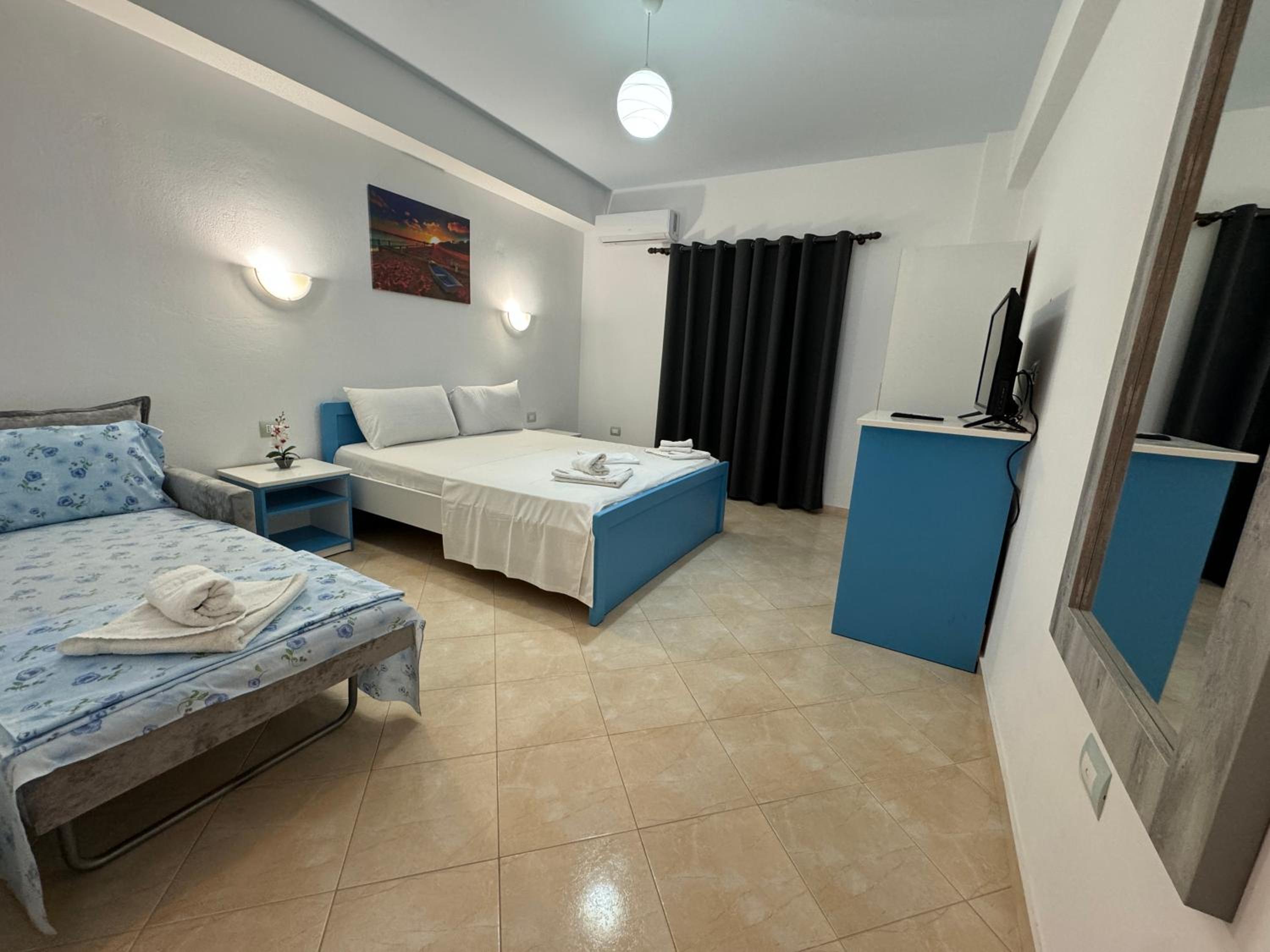 Deluxe Triple Room with Sea View photo 2