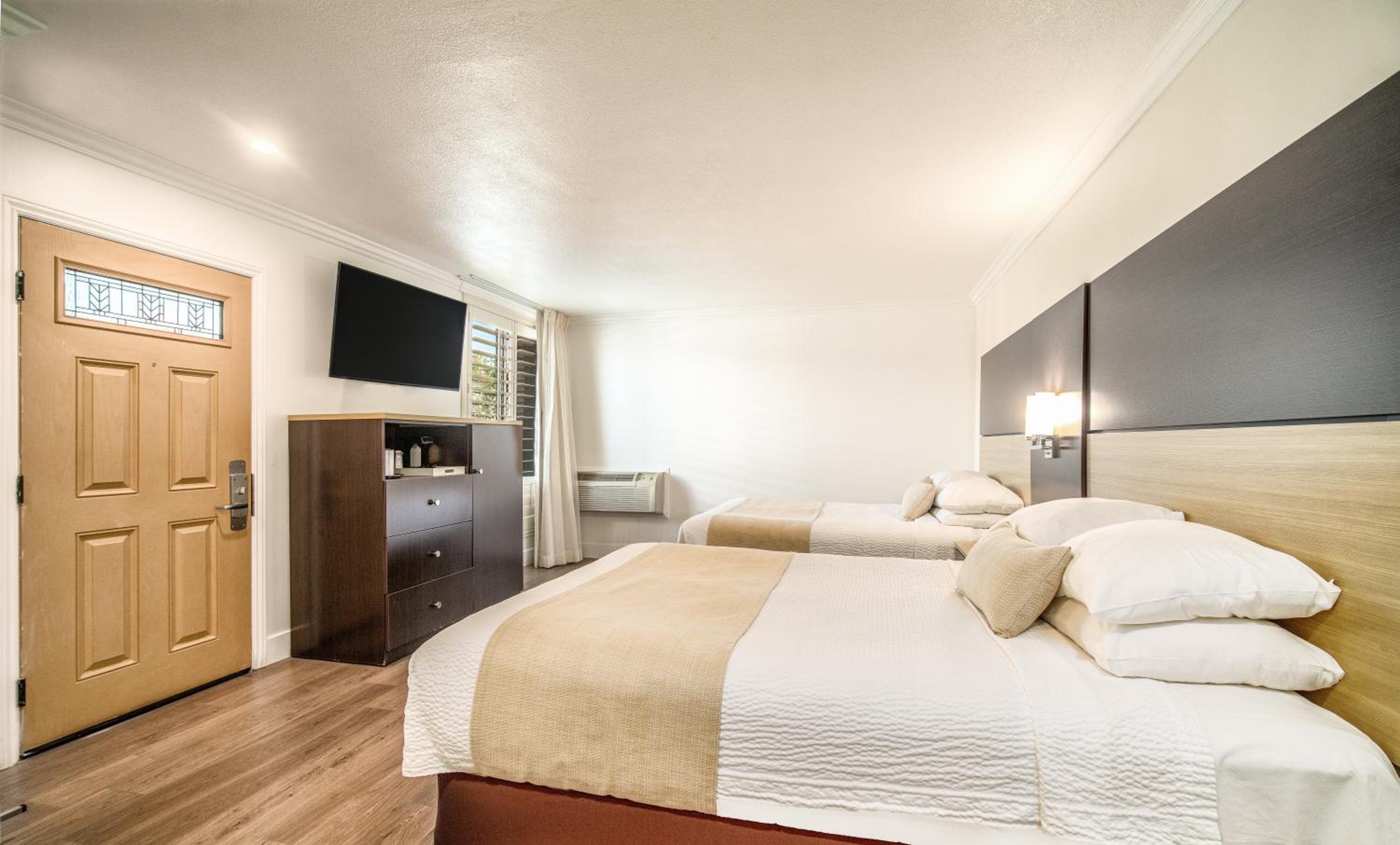 Queen Room with Two Queen Beds - Photo 1