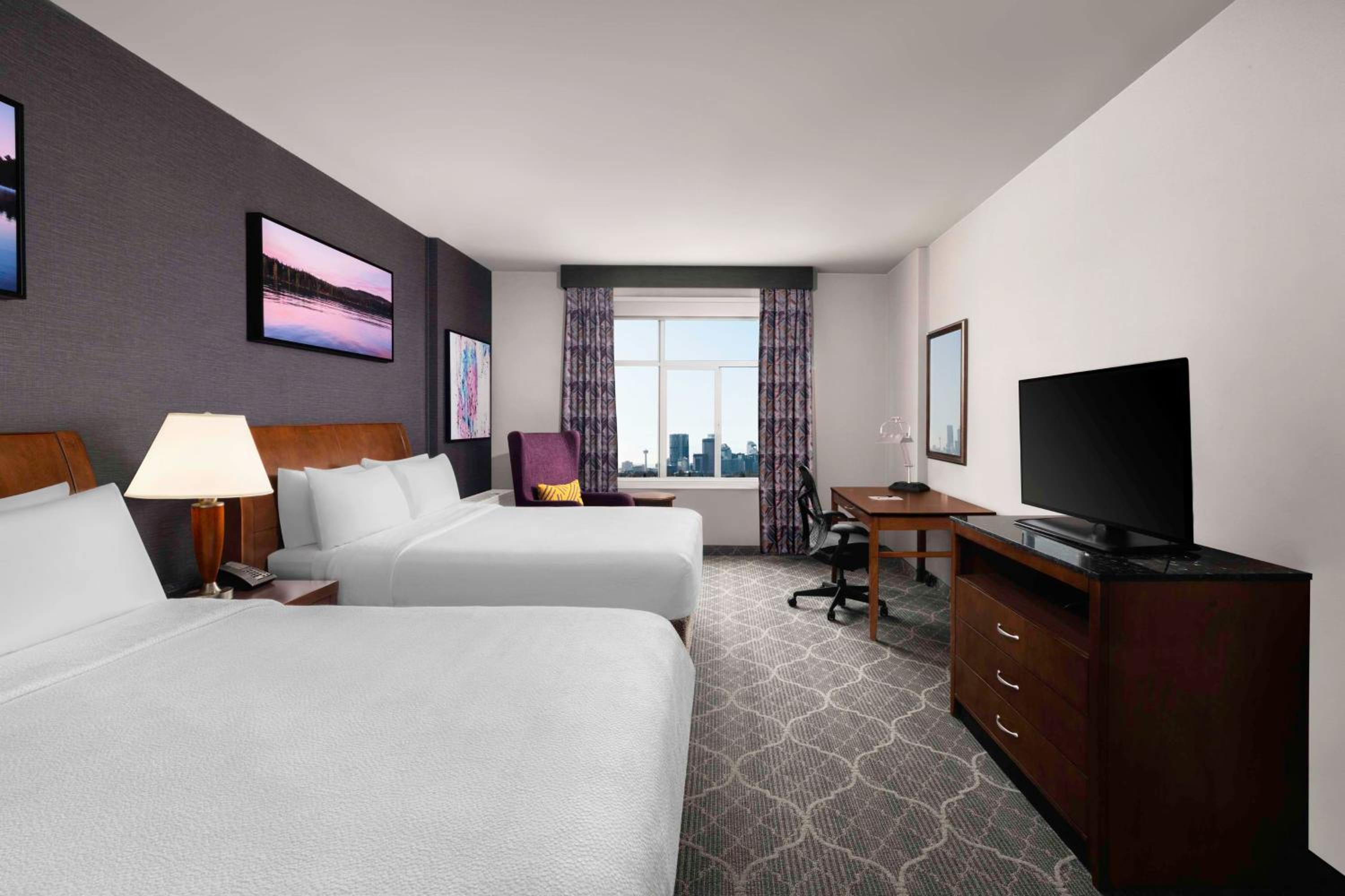 Premium Queen Room with Two Queen Beds - Photo 2