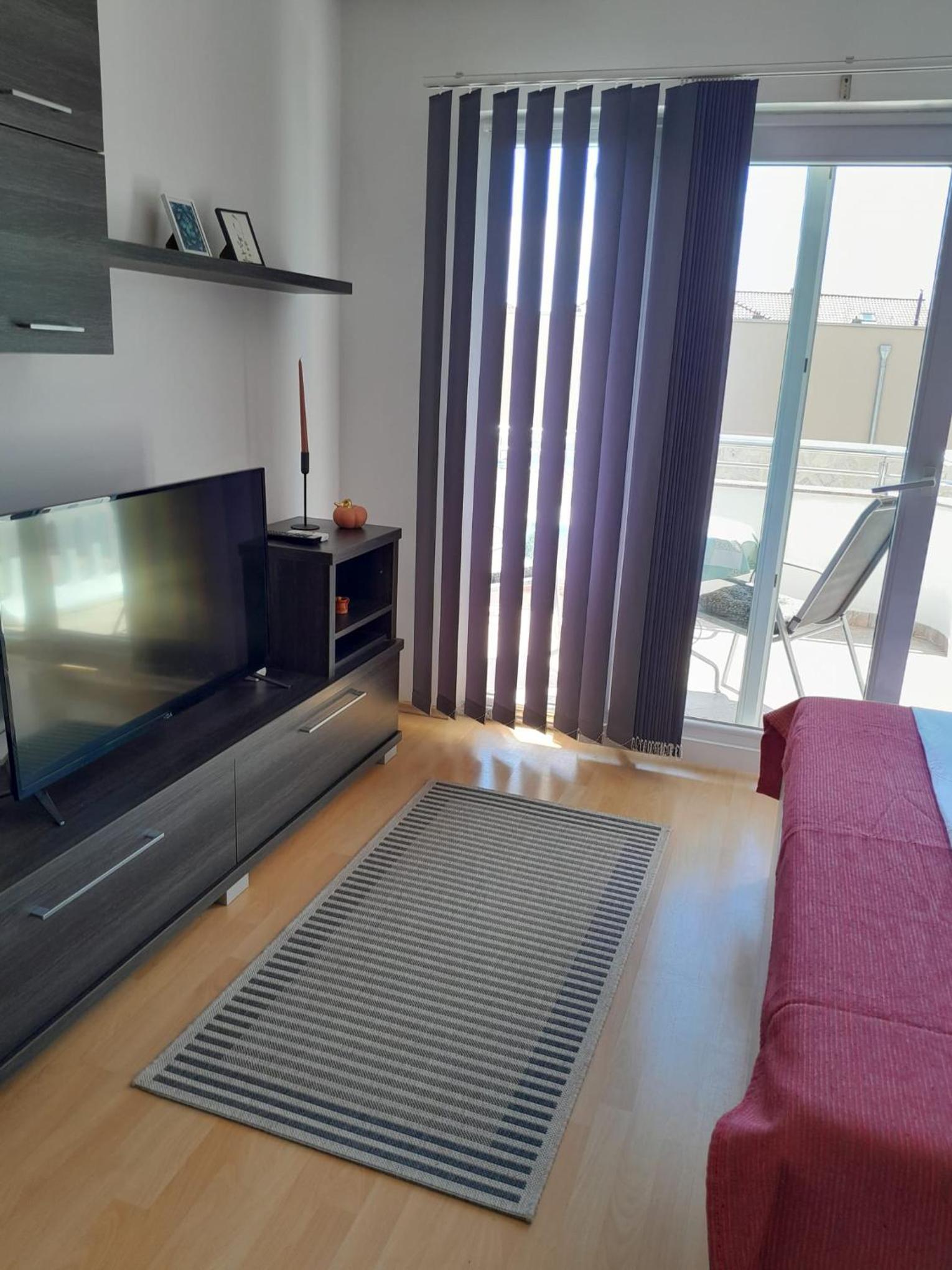 Apartment with Balcony - Photo 13