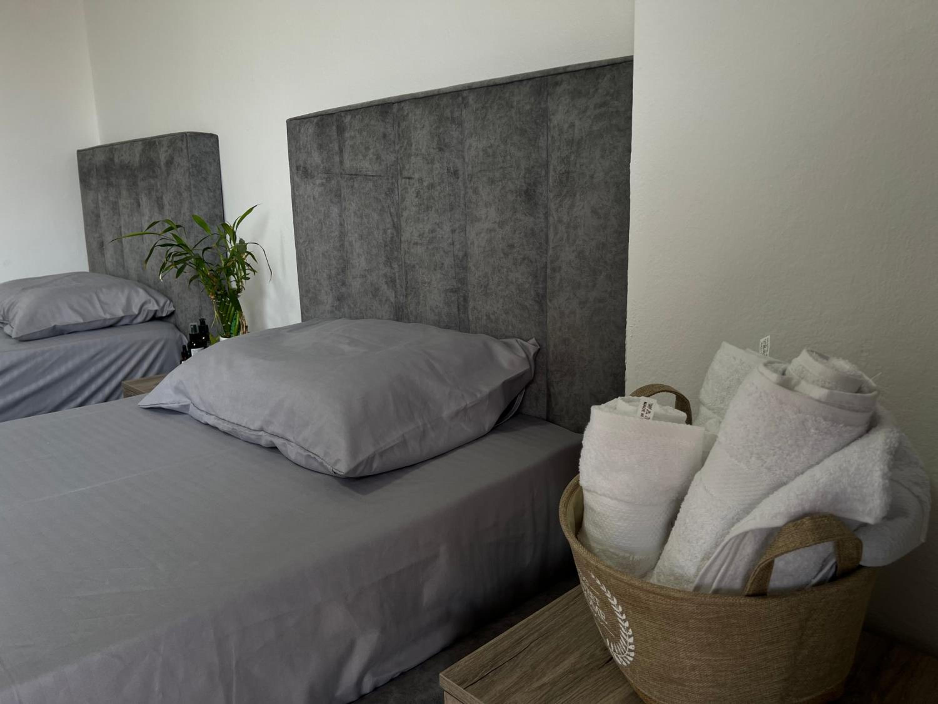 Single Bed In Dormitory Room