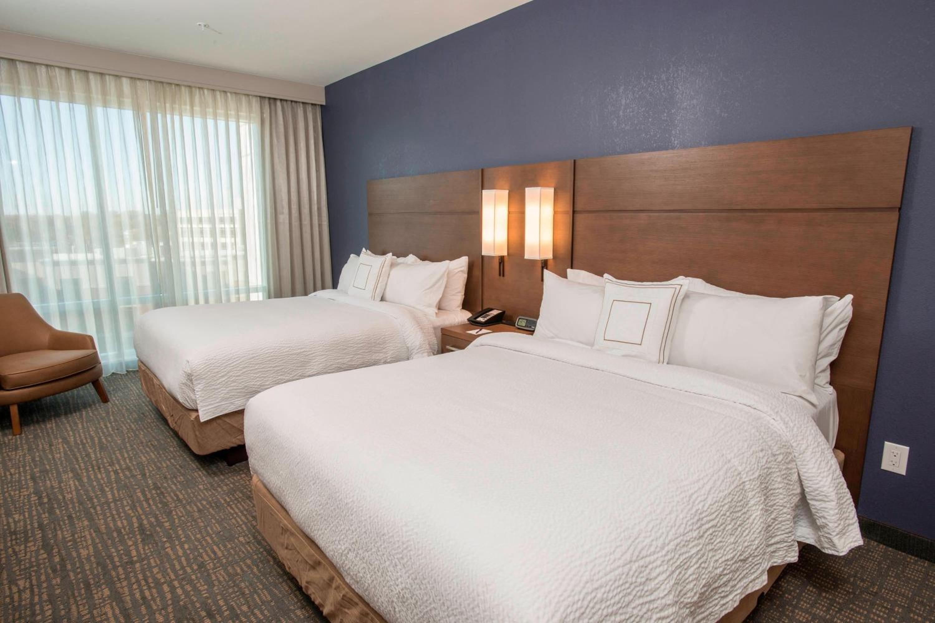 One-Bedroom Suite with Two Queen Beds with Sofa Bed and Roll-In Shower - Mobility and Hearing Accessible photo 1